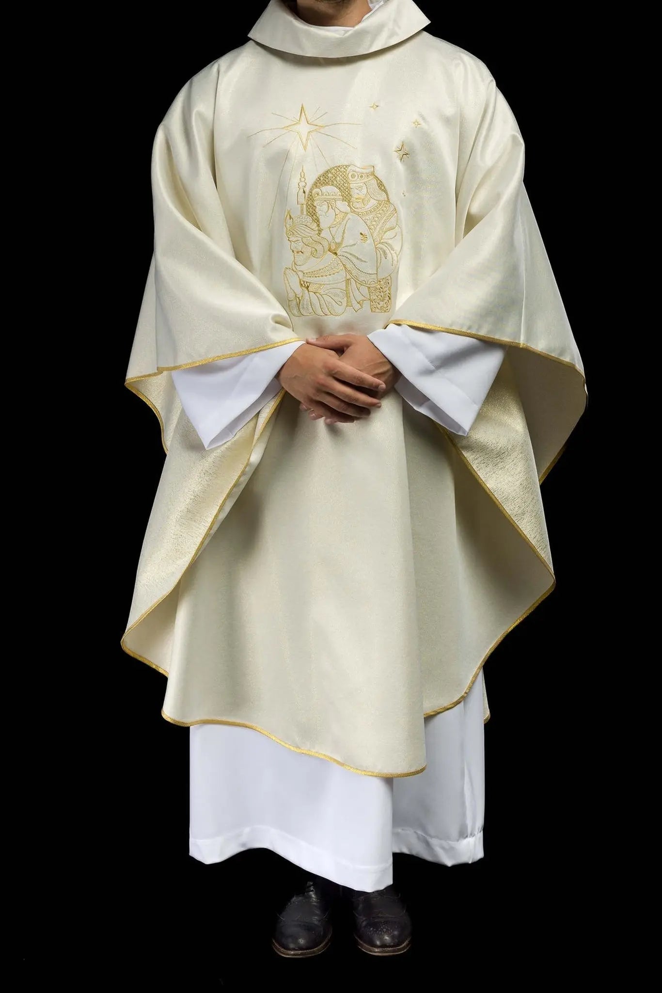 Glittering chasuble with gold embroidery and image of the Three Kings