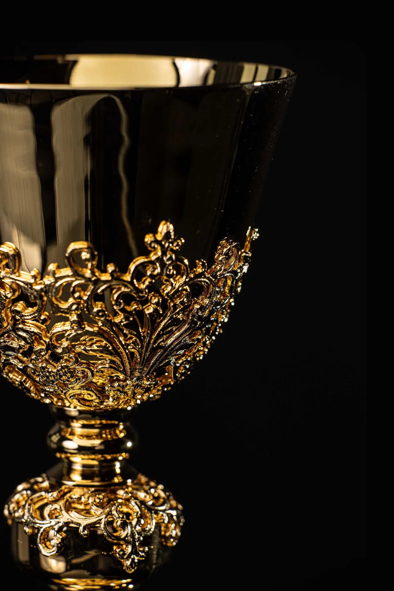 Handmade gold-plated chalice with floral ornamentation on the cup, knop, and base, adorned with blue imitation sapphires.