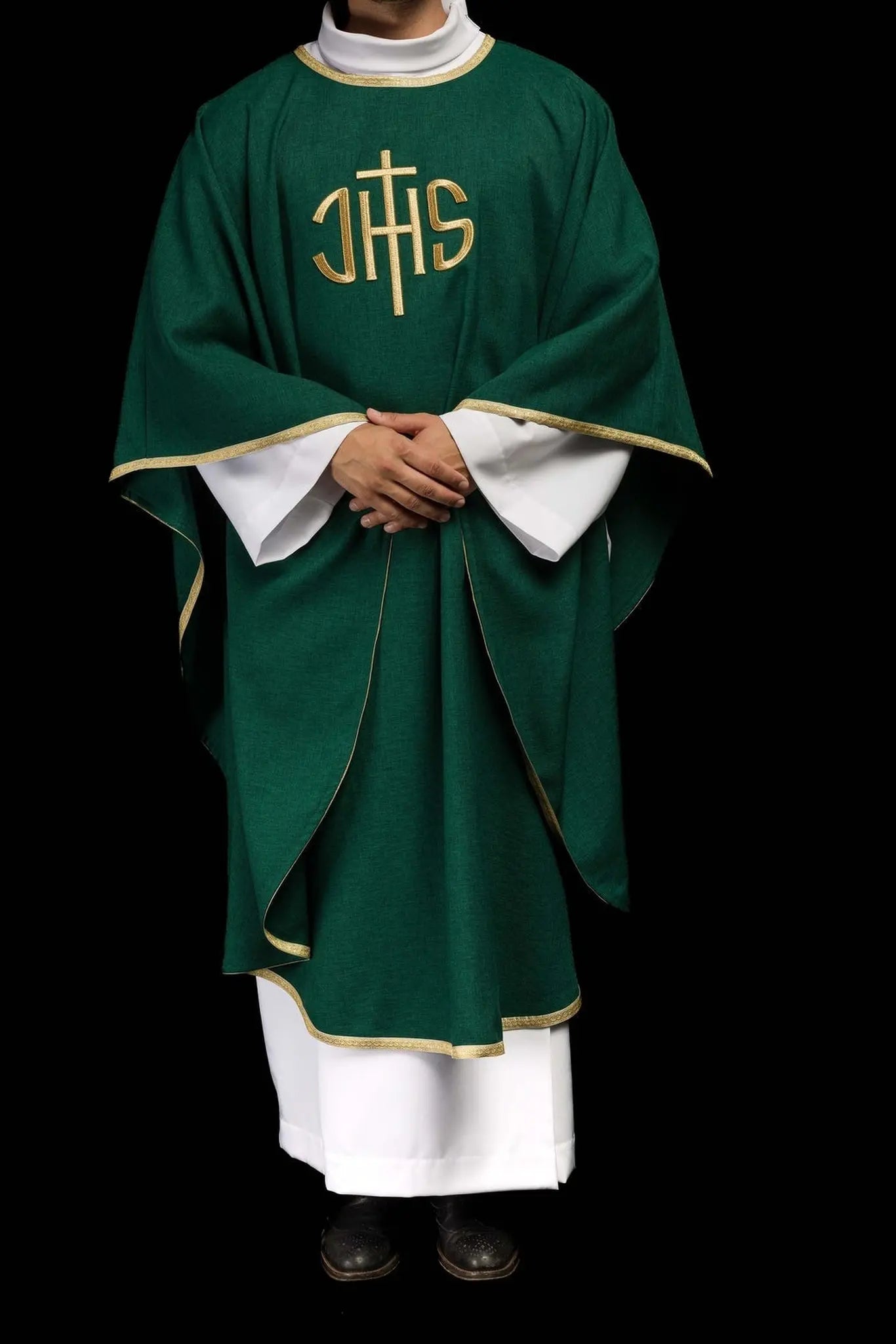 Green liturgical chasuble with a gold IHS embroidery