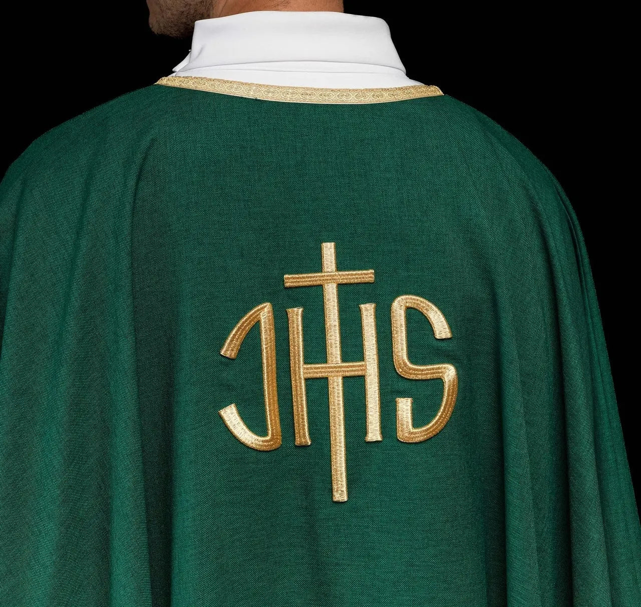 Green liturgical chasuble with a gold IHS embroidery