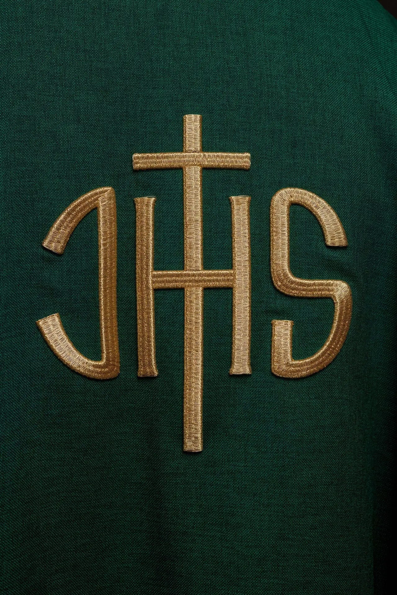 Green liturgical chasuble with a gold IHS embroidery