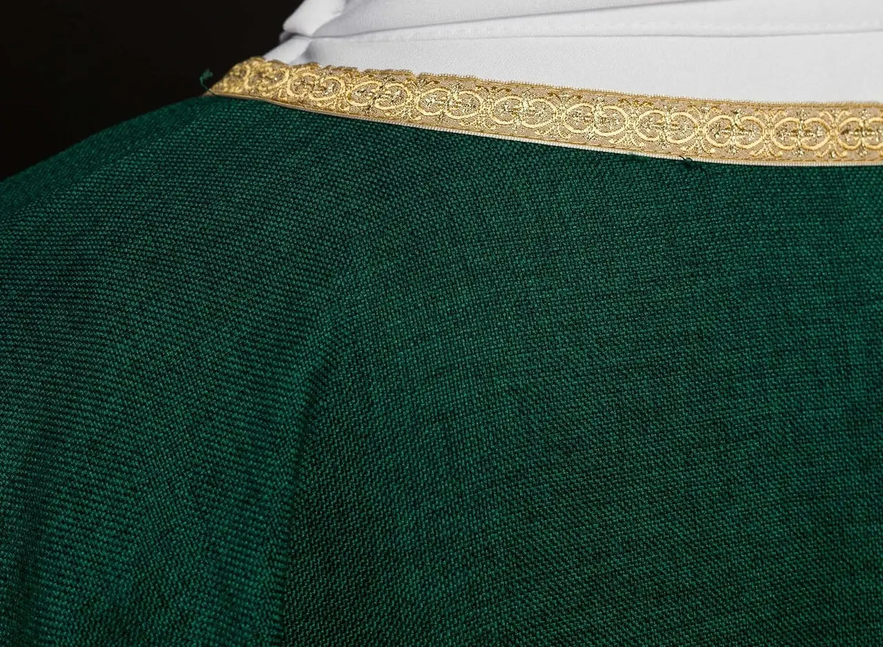 Green liturgical chasuble with a gold IHS embroidery