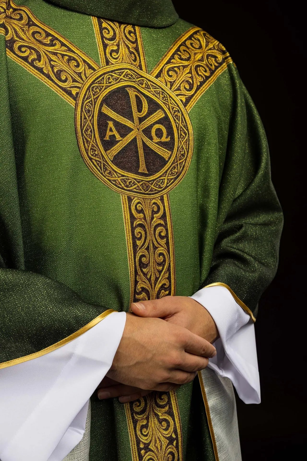 Green printed “Pax” chasuble with rich gold decoration