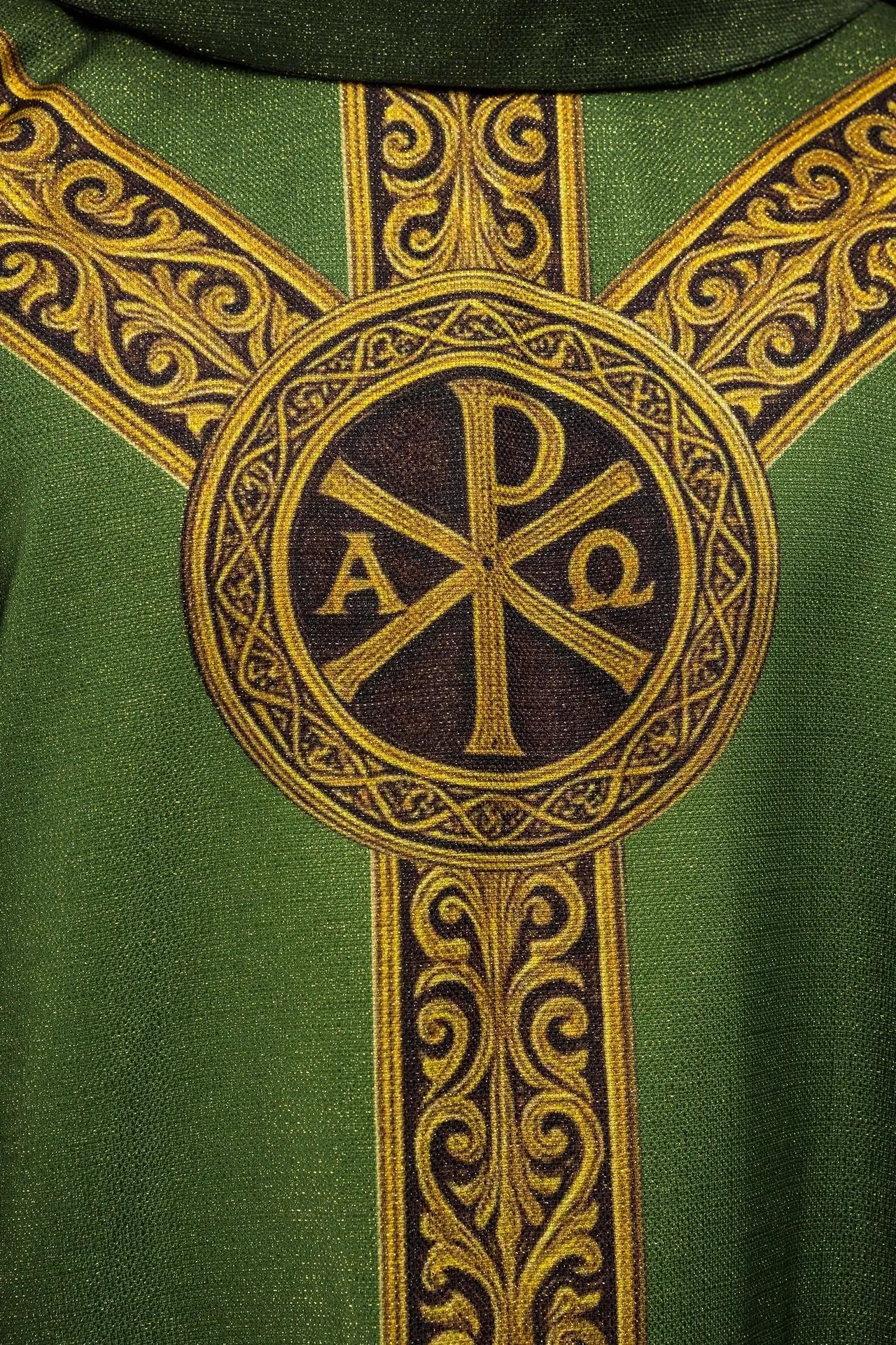 Green printed “Pax” chasuble with rich gold decoration