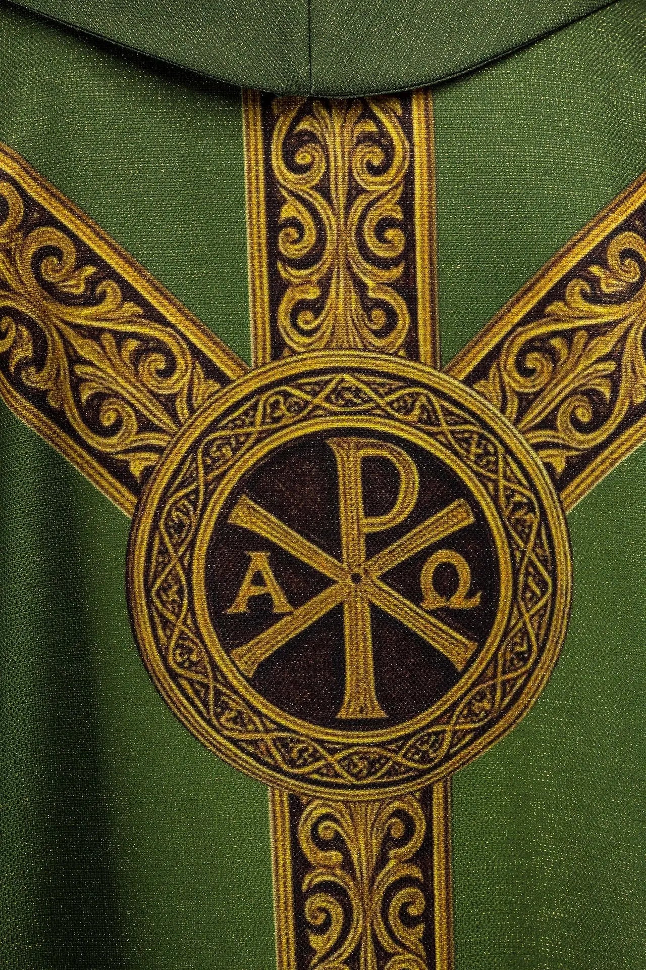 Green printed “Pax” chasuble with rich gold decoration