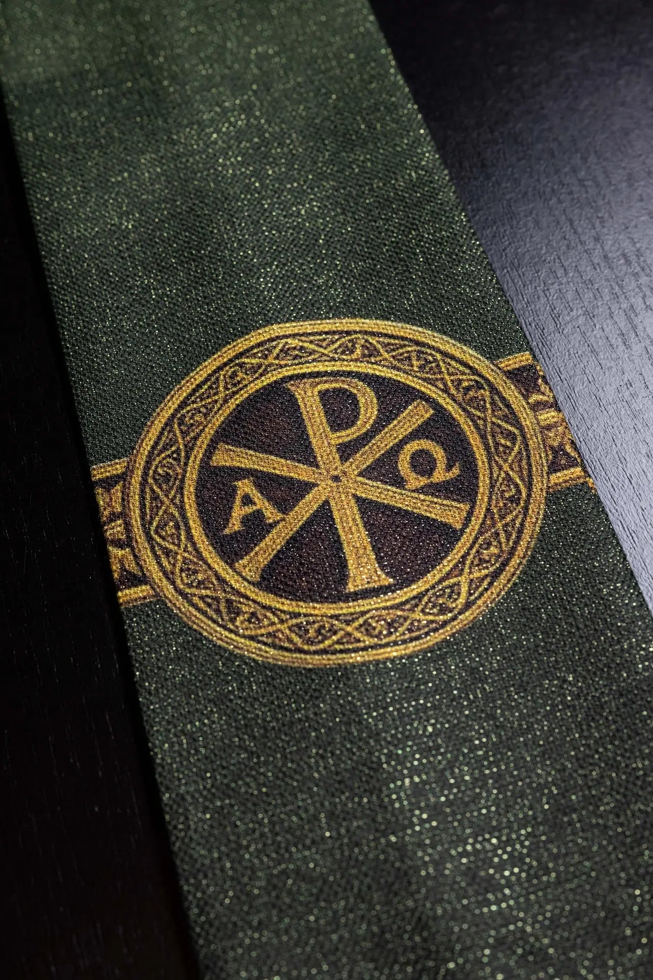 Green printed “Pax” chasuble with rich gold decoration