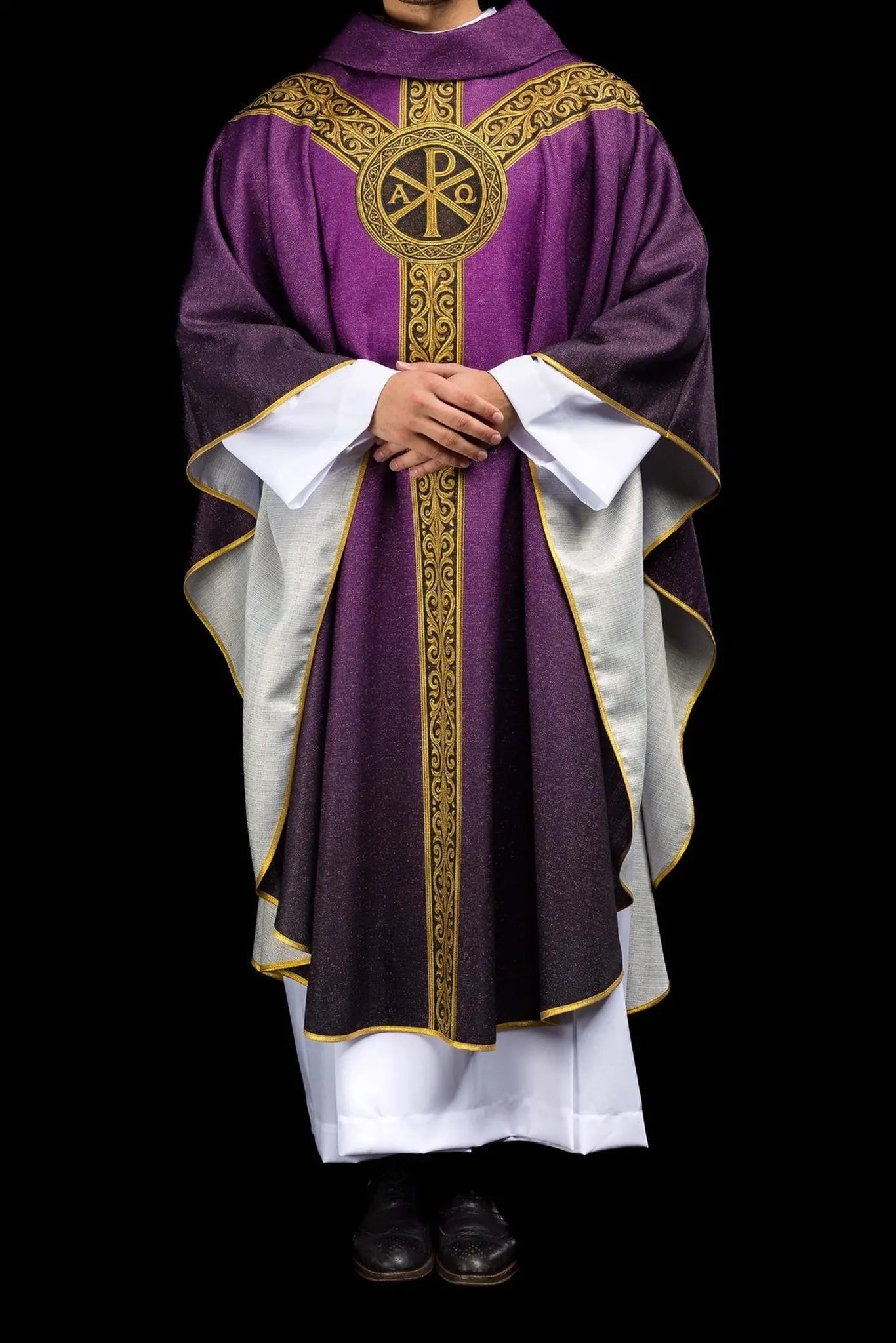 Purple printed “Pax” chasuble with rich gold decoration