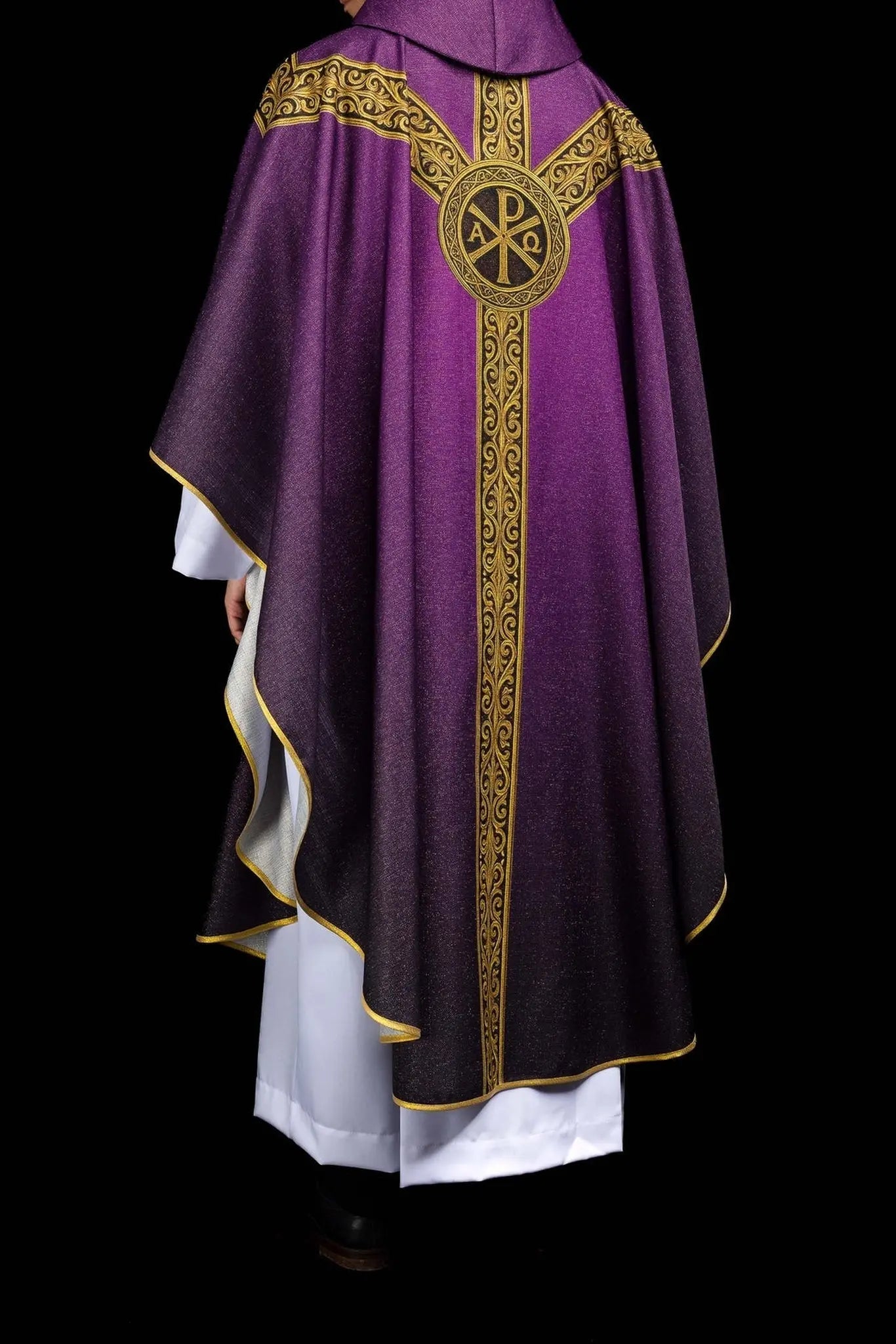 Purple printed “Pax” chasuble with rich gold decoration