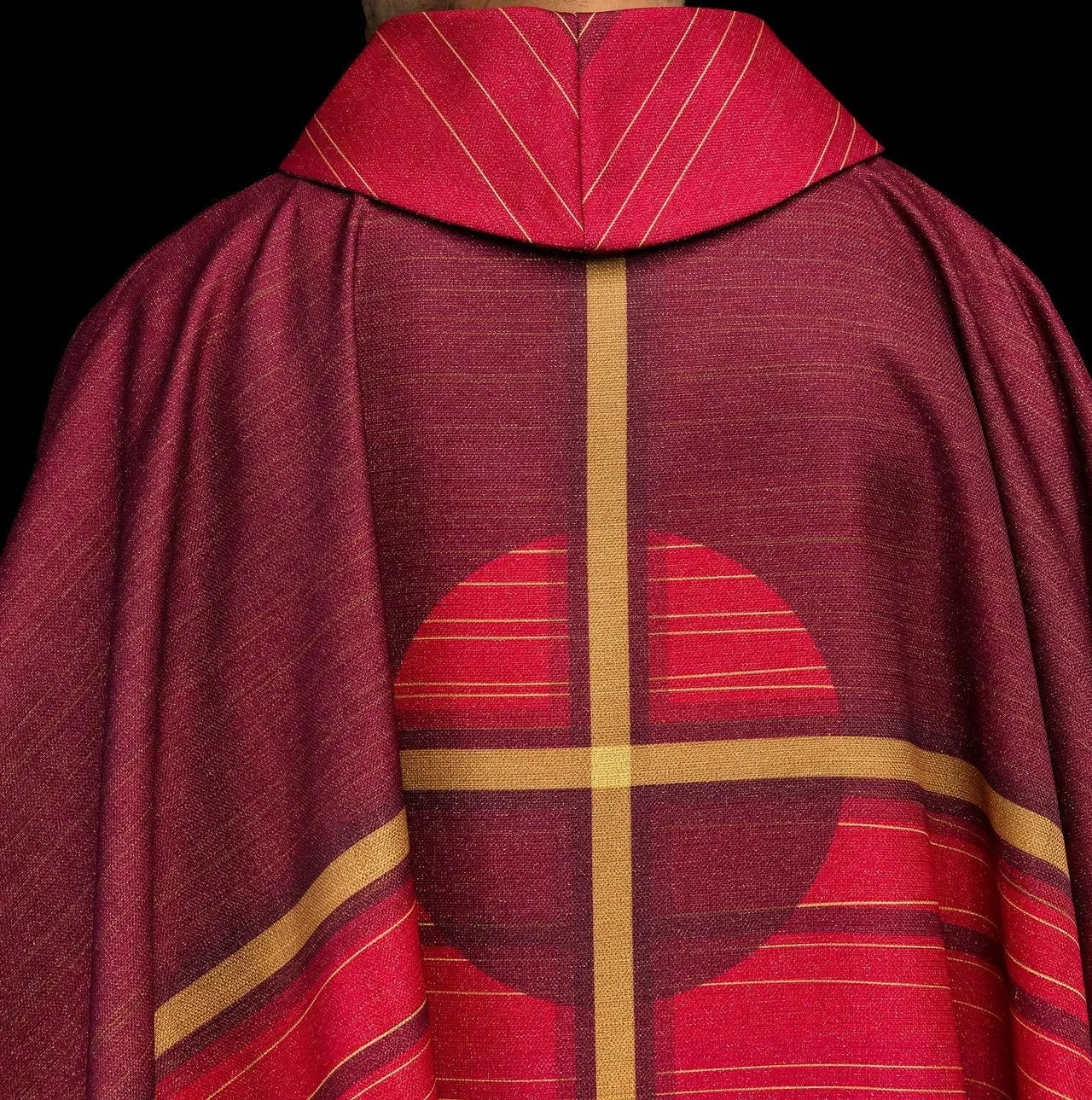 Red printed chasuble with a cross motif