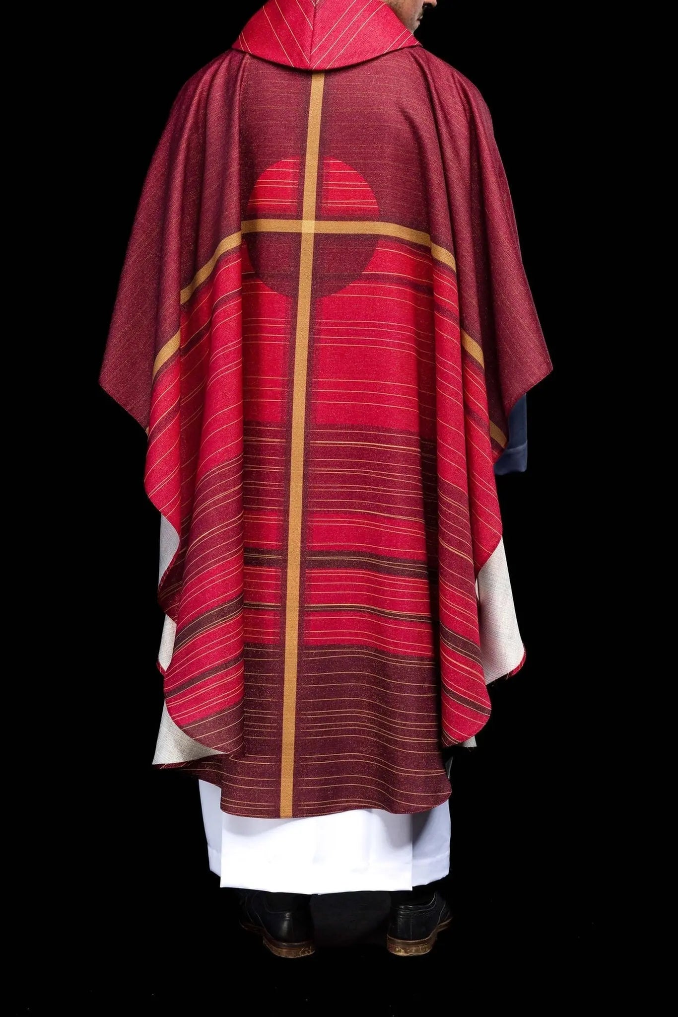 Red printed chasuble with a cross motif