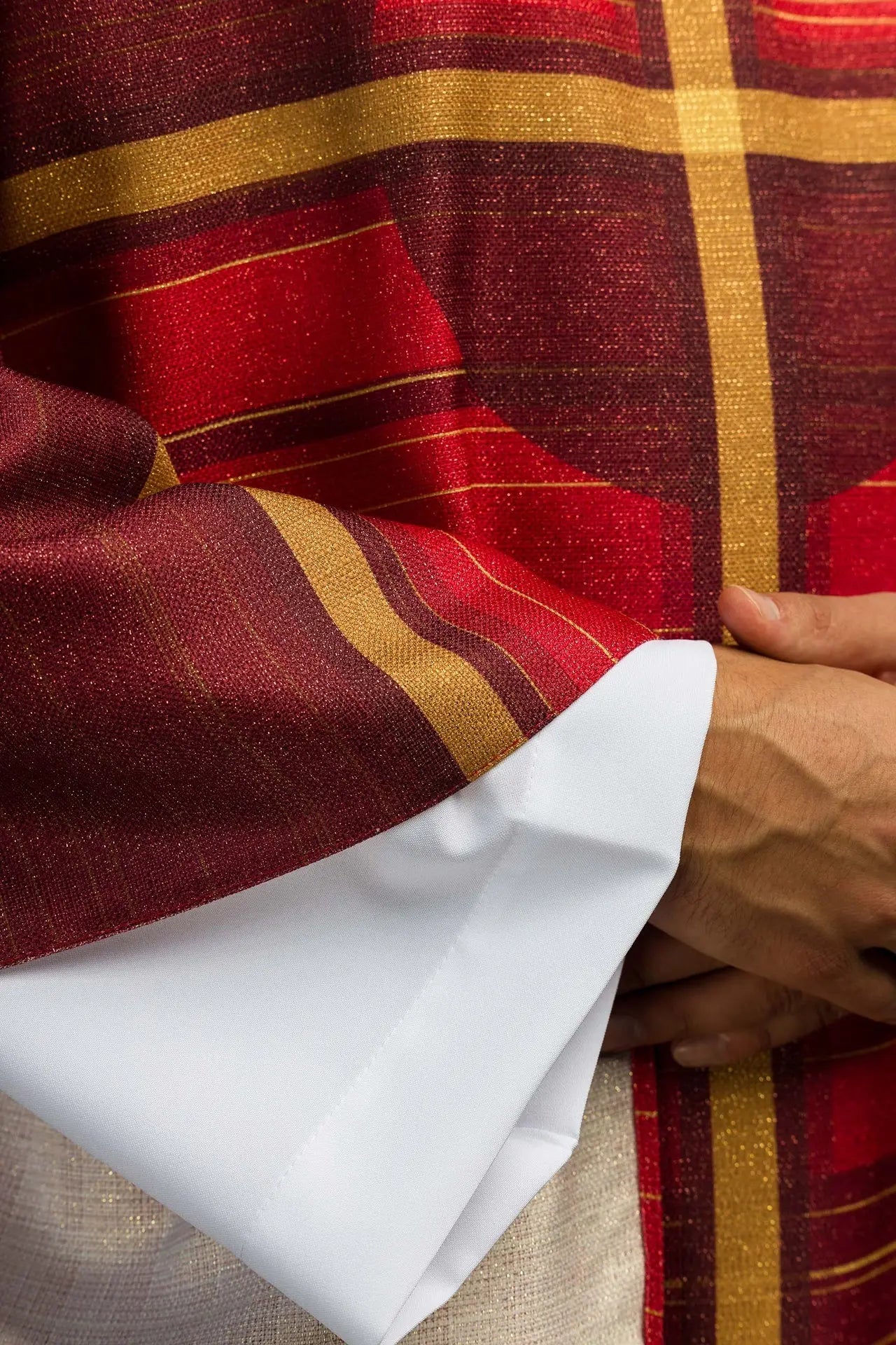 Red printed chasuble with a cross motif