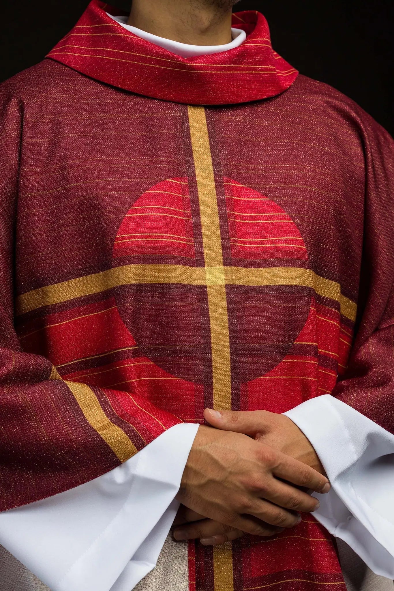 Red printed chasuble with a cross motif