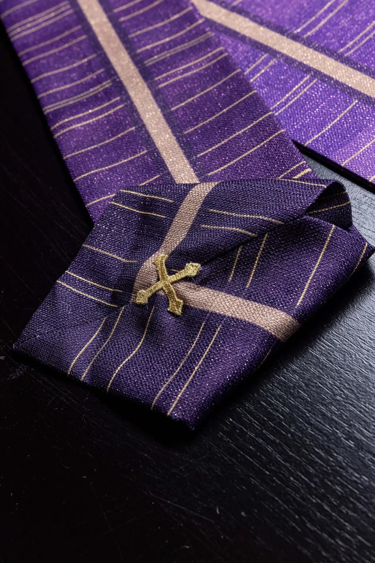 Purple printed chasuble with a cross motif
