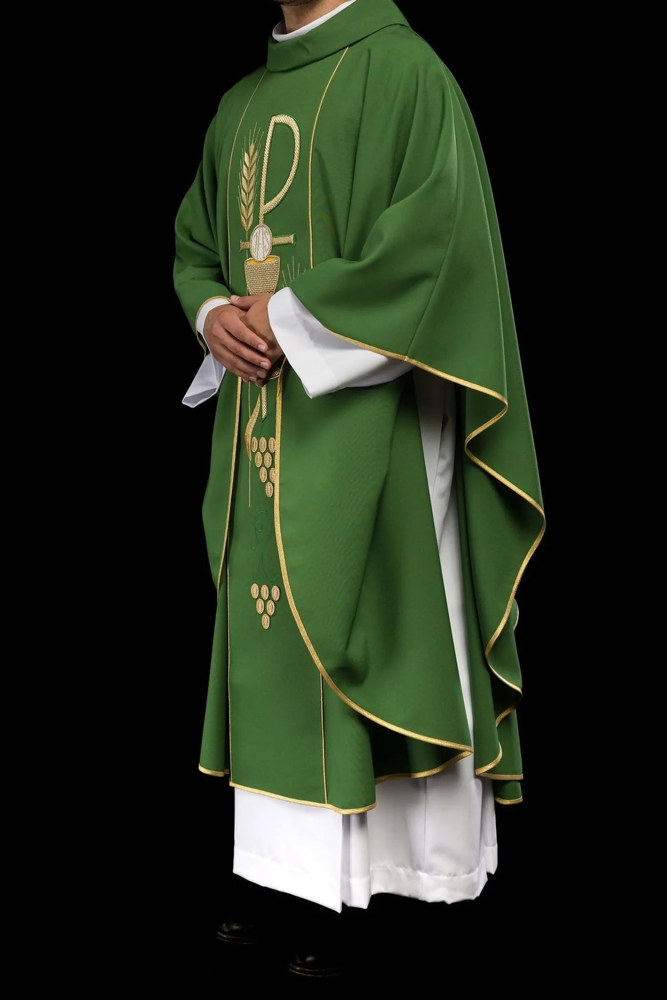Green chasuble embroidered with IHS chalice design