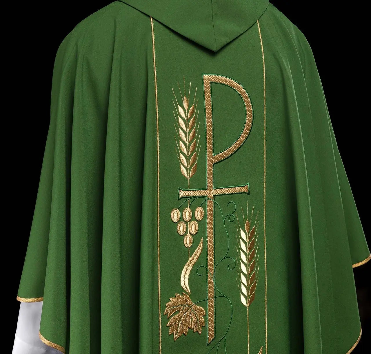 Green chasuble embroidered with IHS chalice design