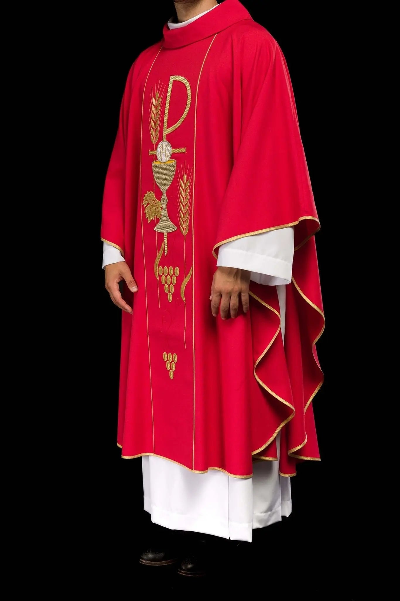 Red chasuble embroidered with IHS chalice design
