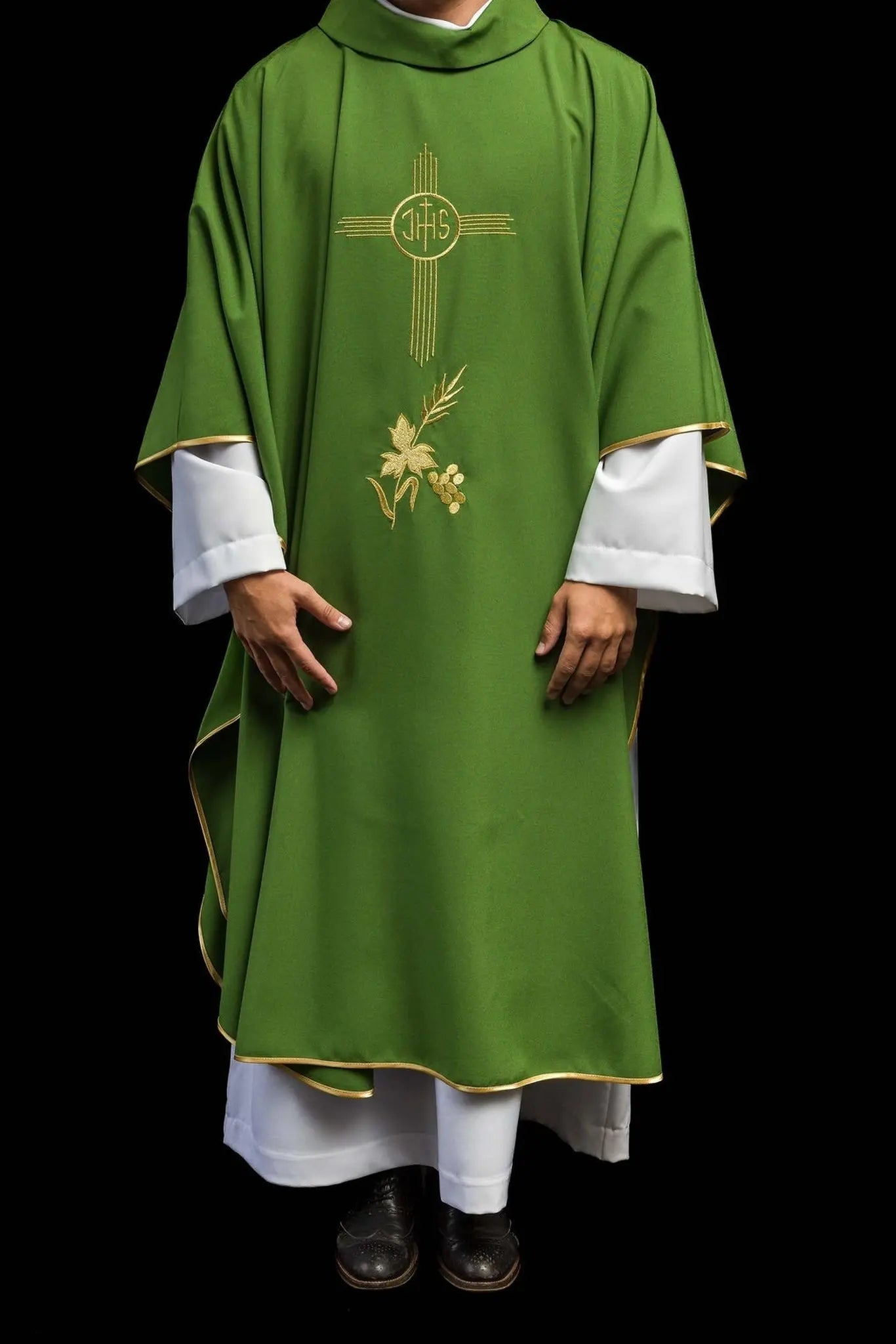 Green chasuble embroidered with IHS motif