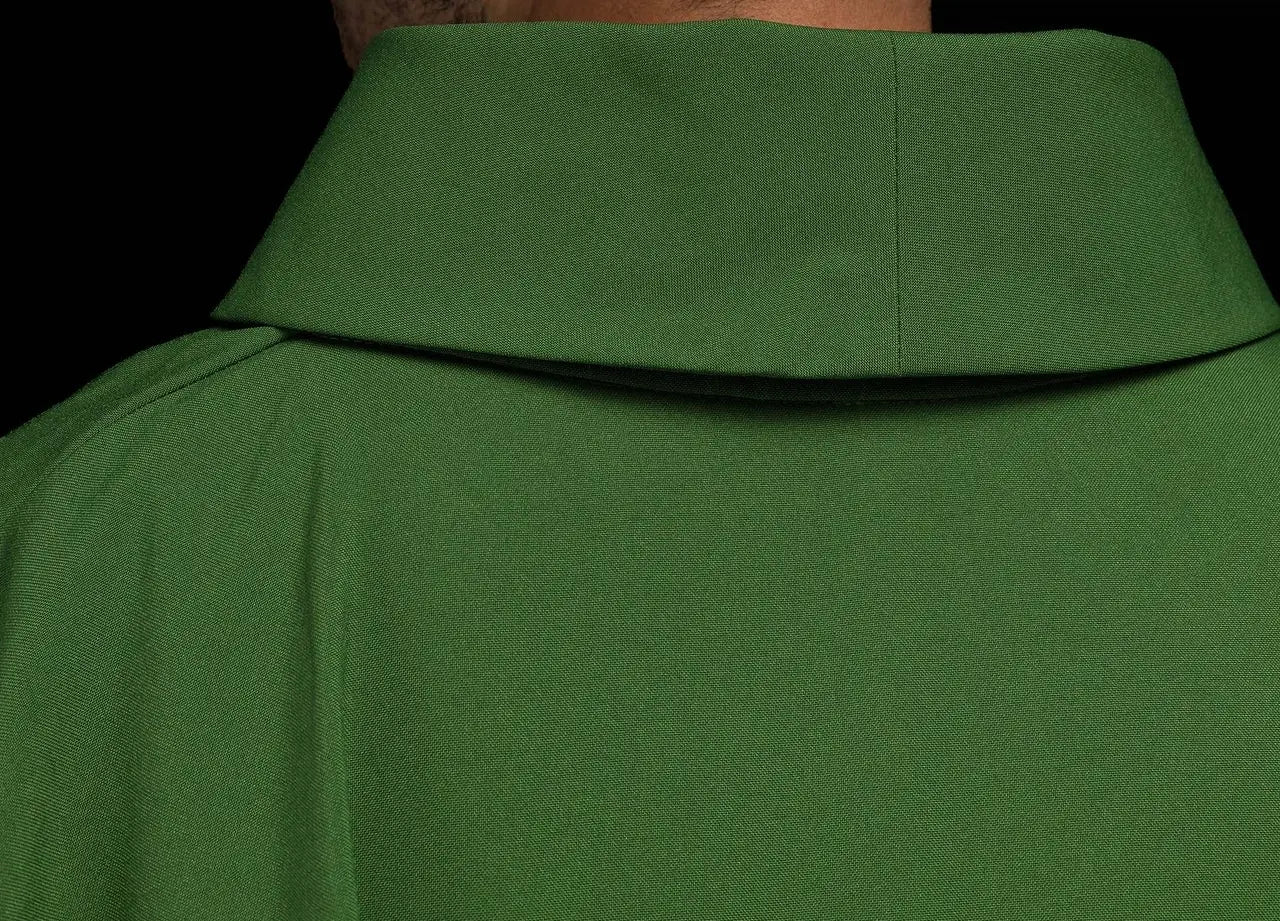 Green embroidered chasuble with gold IHS motif