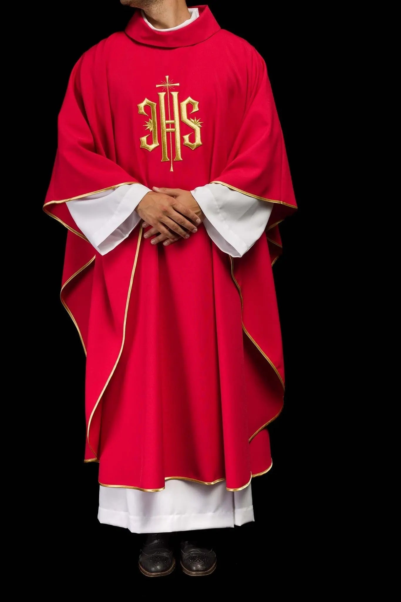 Red chasuble embroidered with gold IHS motif