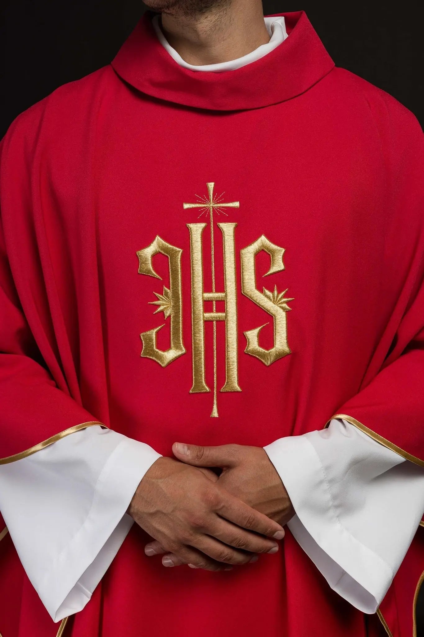 Red chasuble embroidered with gold IHS motif