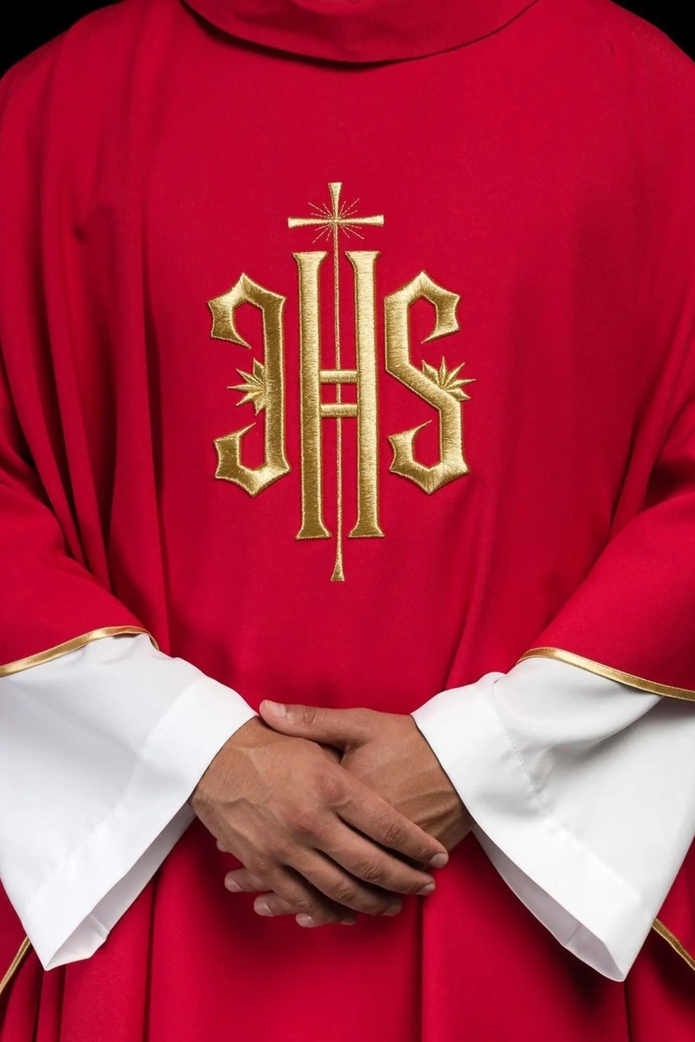 Red chasuble embroidered with gold IHS motif