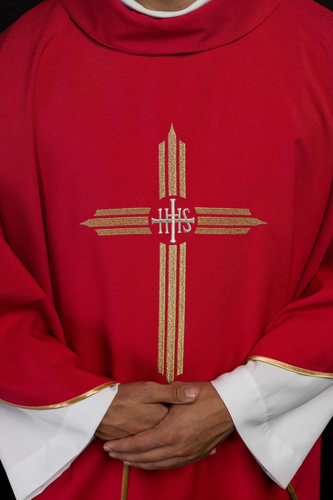 Red chasuble embroidered with IHS Cross