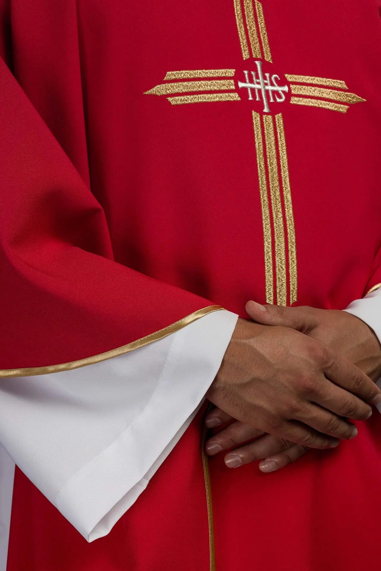 Red chasuble embroidered with IHS Cross
