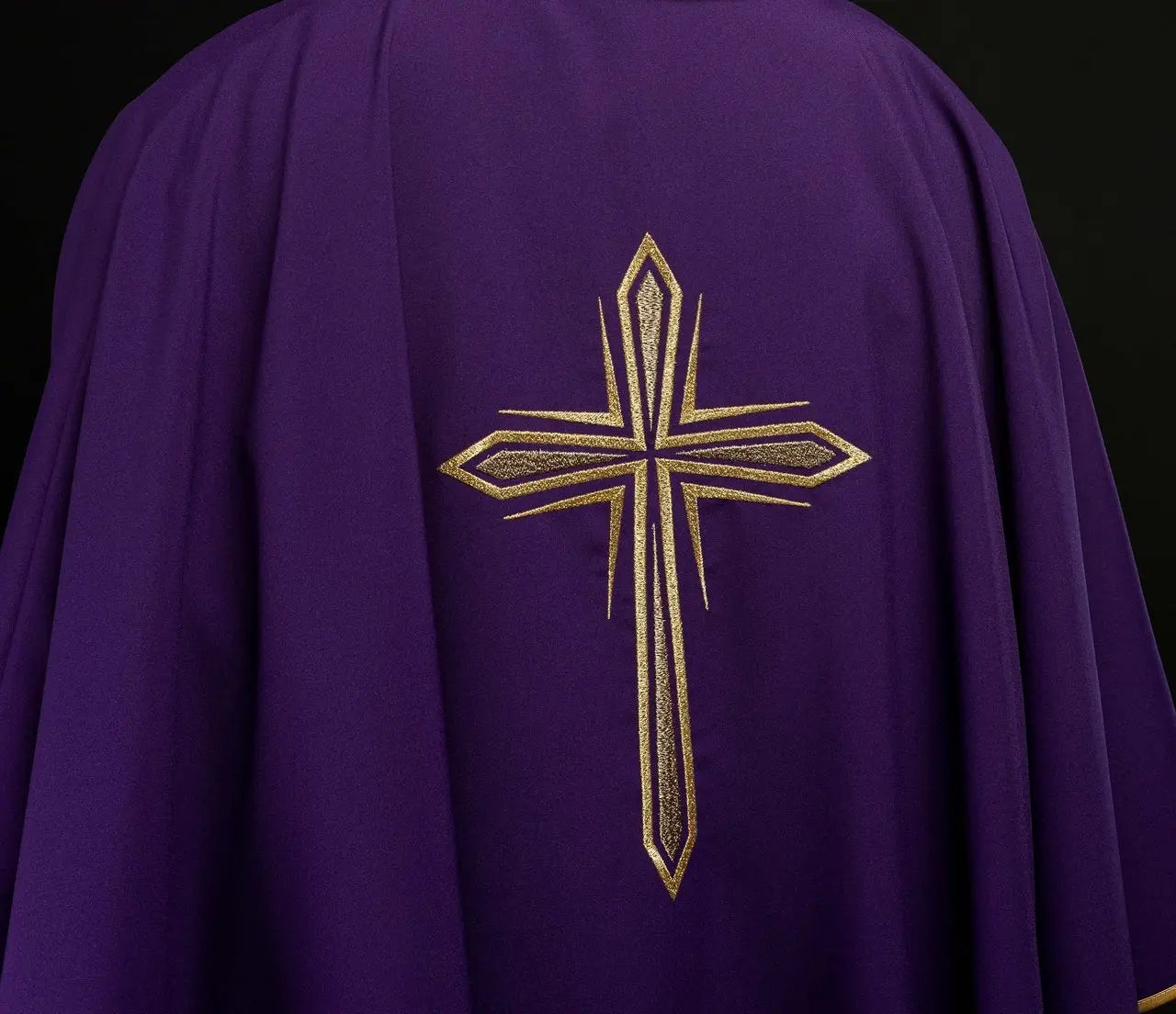 Purple chasuble with embroidery of the cross and gold piping
