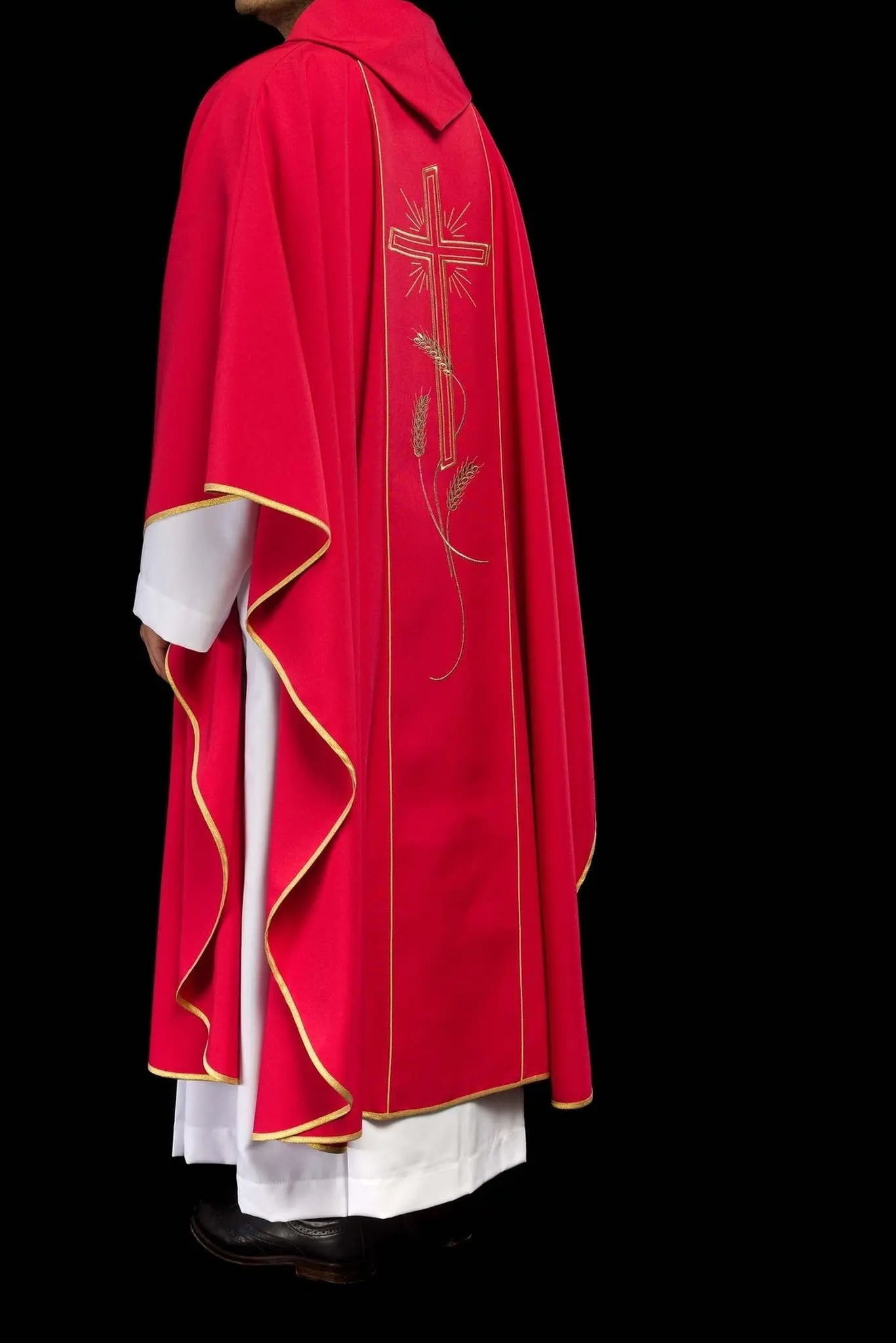 Red chasuble with wide embroidered gold stripe IHS cross