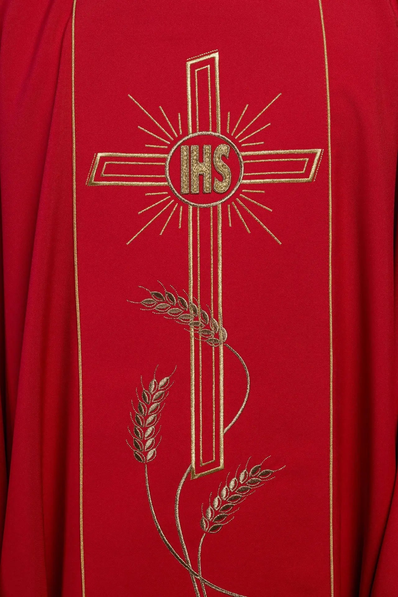 Red chasuble with wide embroidered gold stripe IHS cross