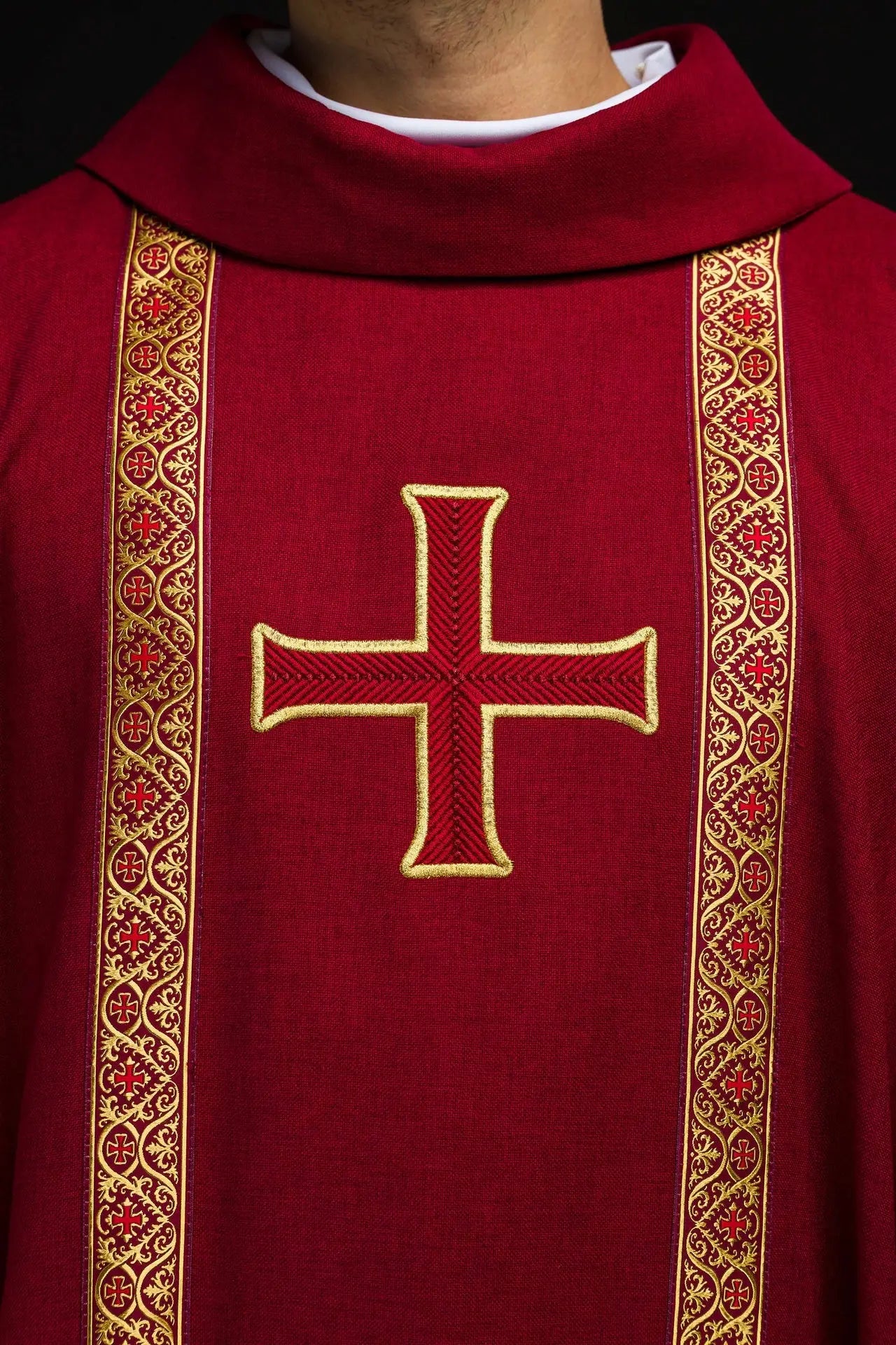 Red liturgical chasuble with embroidered cross and jacquard bands