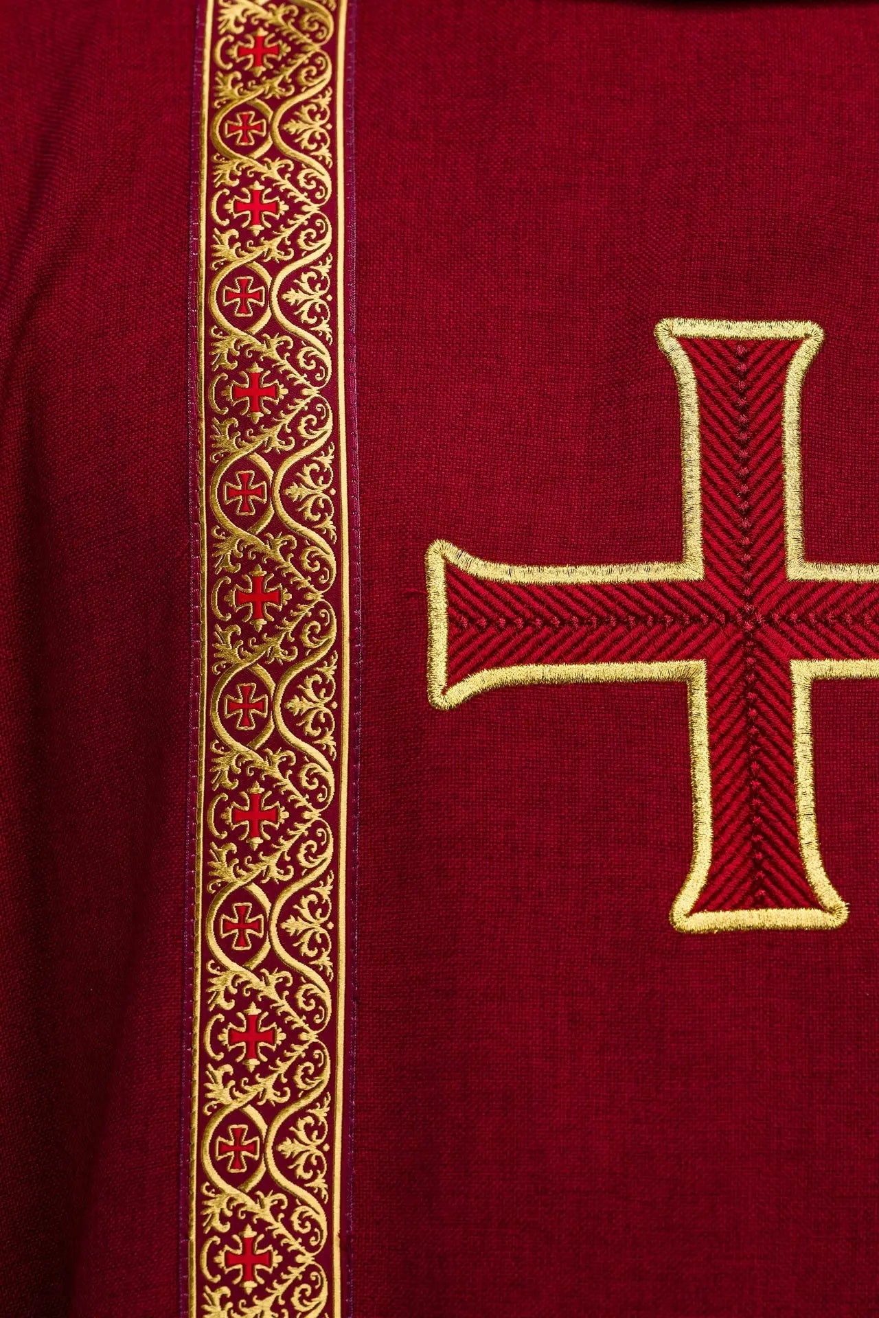 Red liturgical chasuble with embroidered cross and jacquard bands