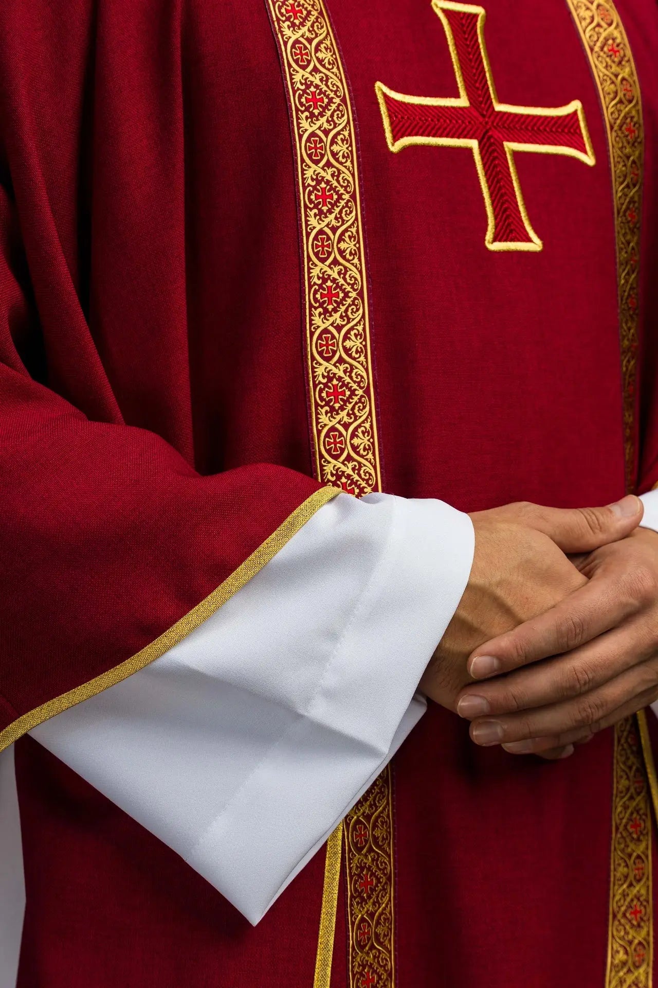 Red liturgical chasuble with embroidered cross and jacquard bands