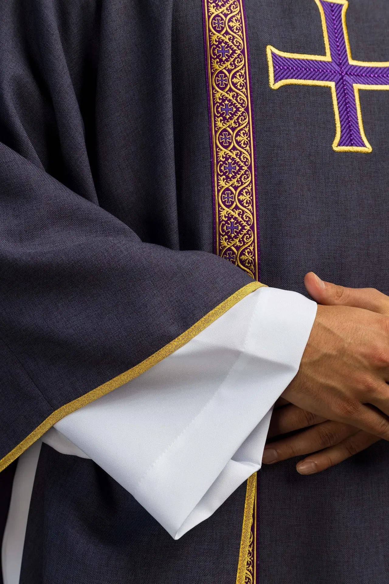 Purple liturgical chasuble with embroidered cross and jacquard bands