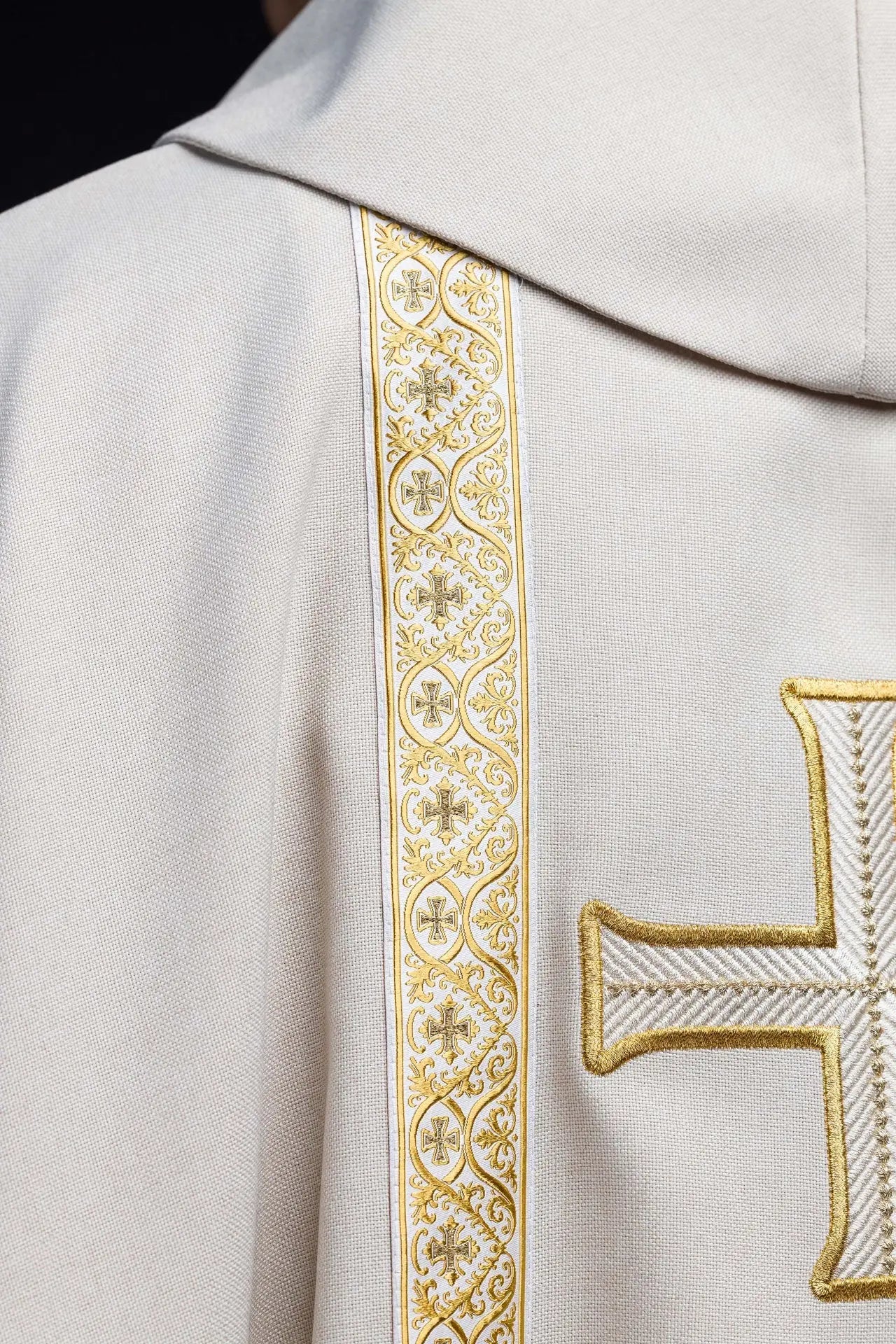 Ecru liturgical chasuble with embroidered cross and jacquard bands