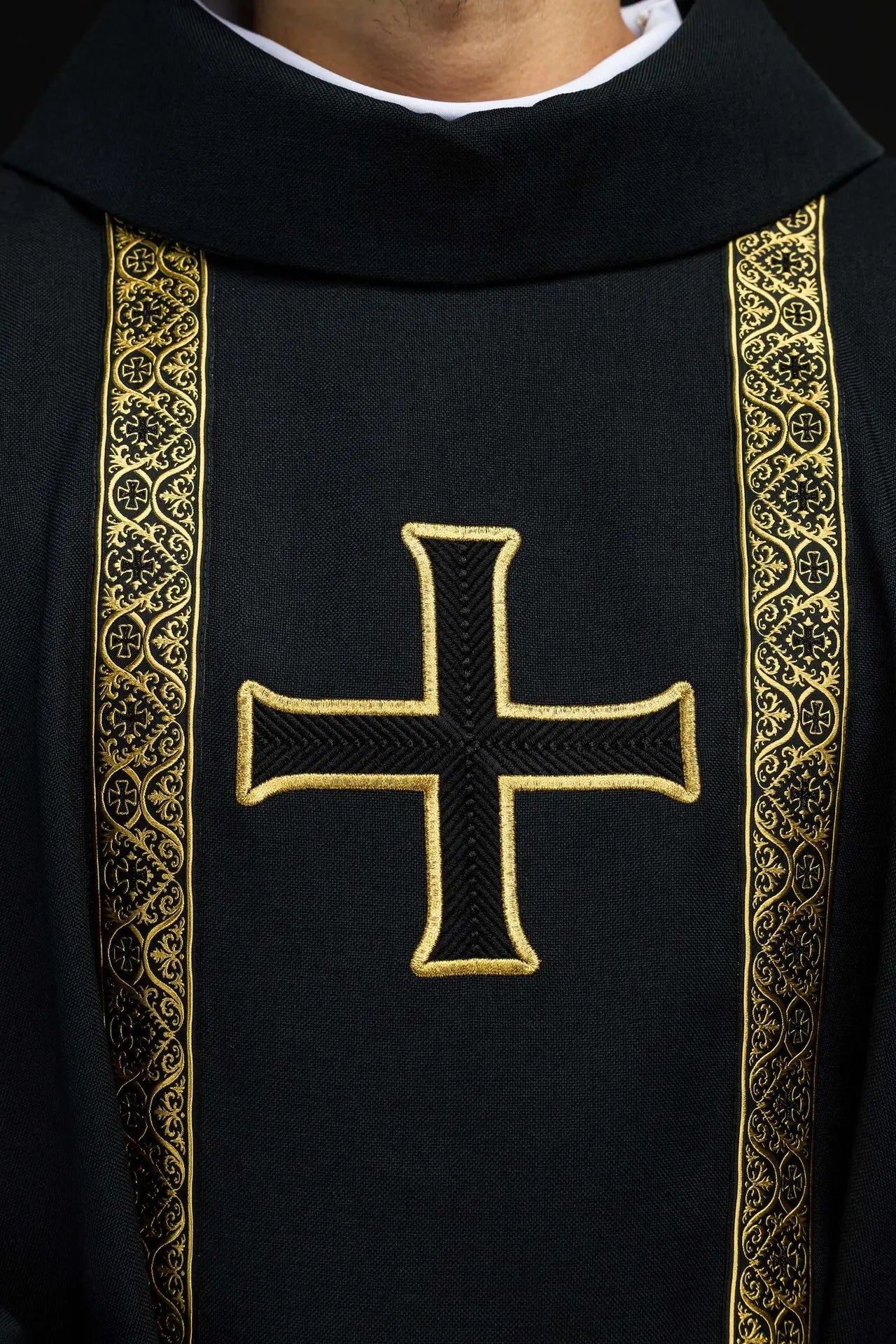 Black liturgical chasuble with embroidered cross and jacquard bands