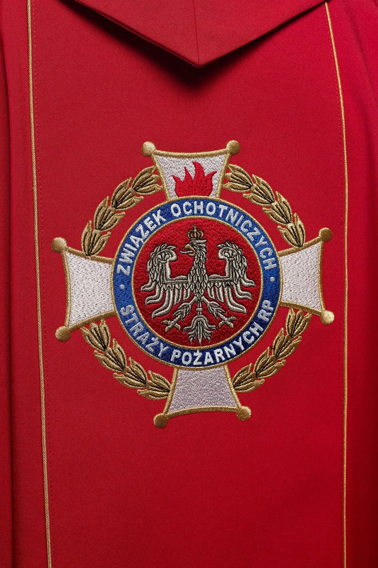 Richly embroidered chasuble featuring an image of Saint Florian