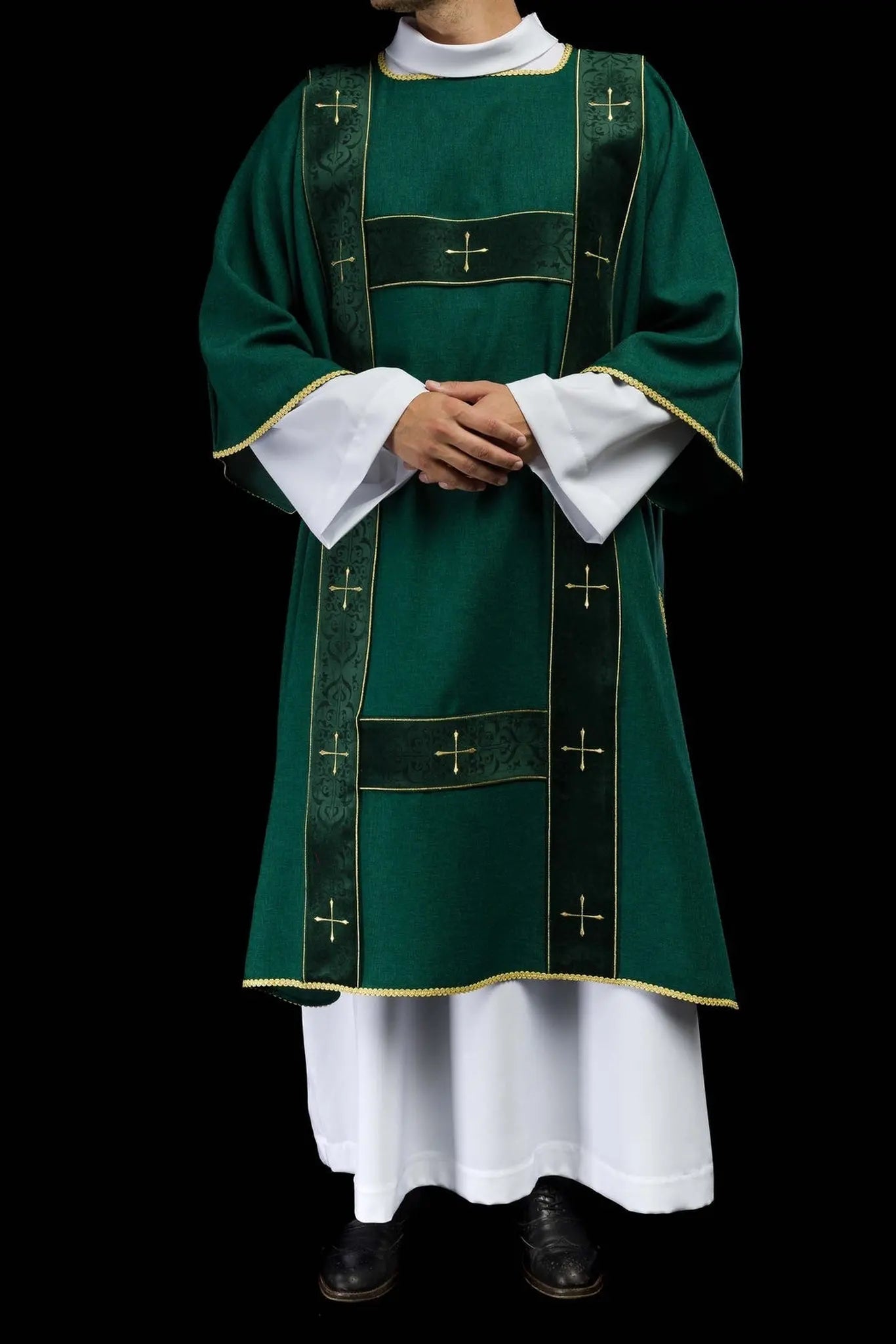 Green dalmatic with velvet stripes and embroidered gold crosses