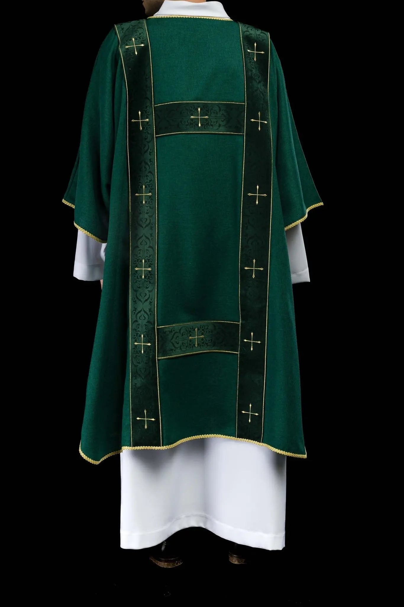 Green dalmatic with velvet stripes and embroidered gold crosses