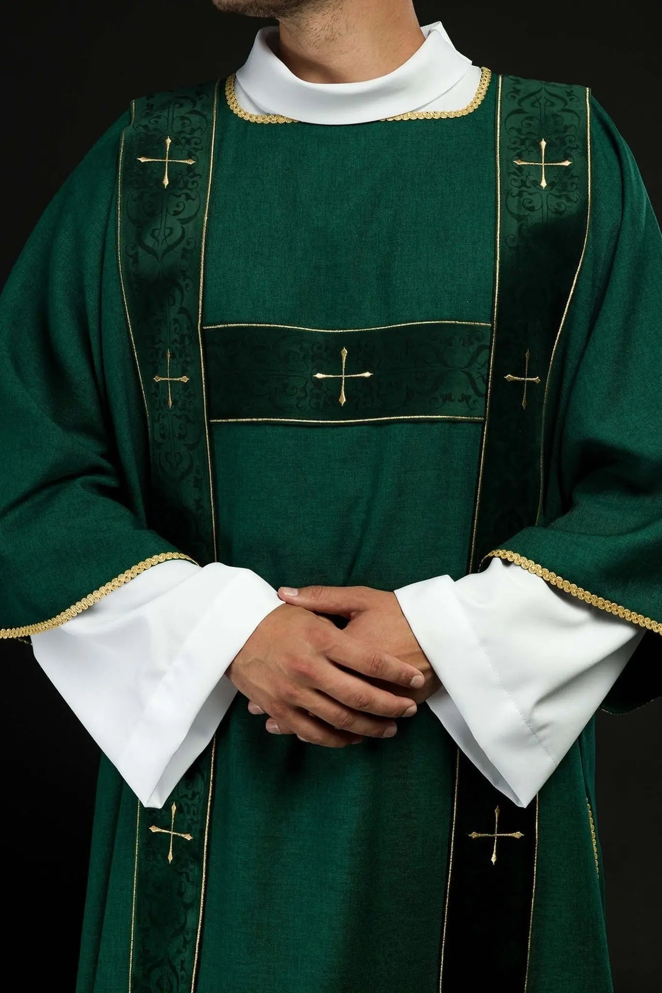 Green dalmatic with velvet stripes and embroidered gold crosses