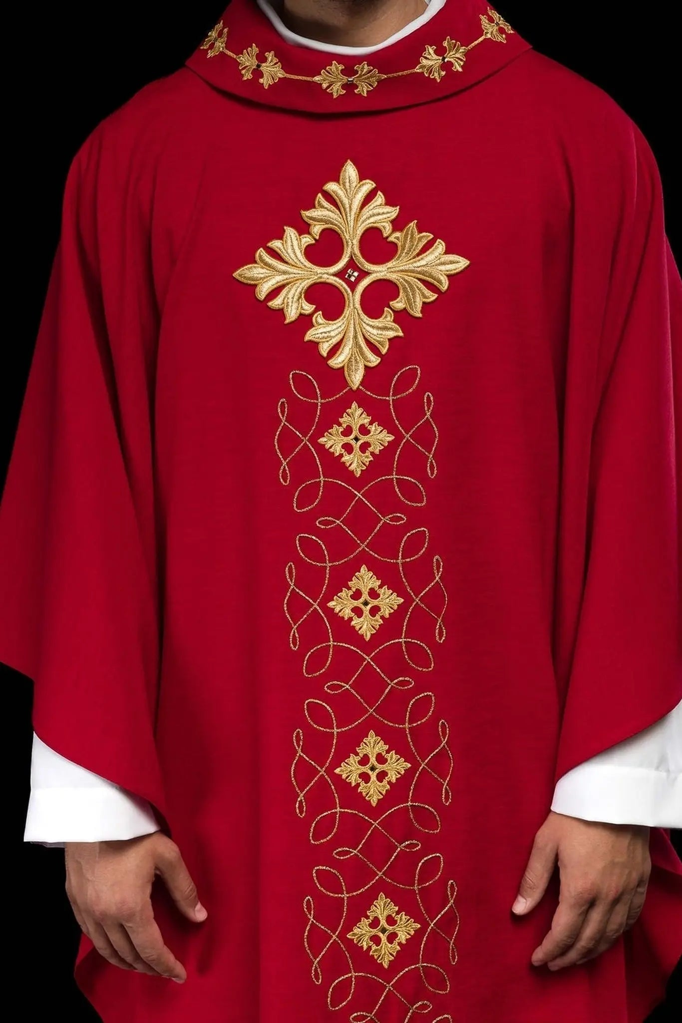 Red chasuble richly embroidered with rope and stones
