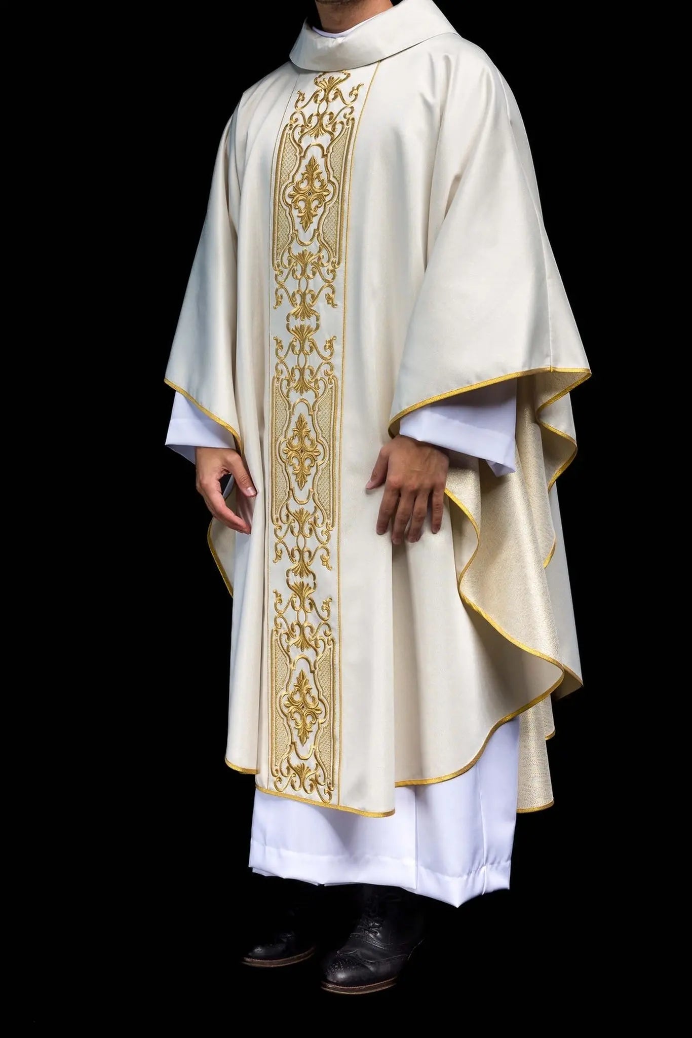 Shimmering fabric chasuble with rich gold embroidery on the belt