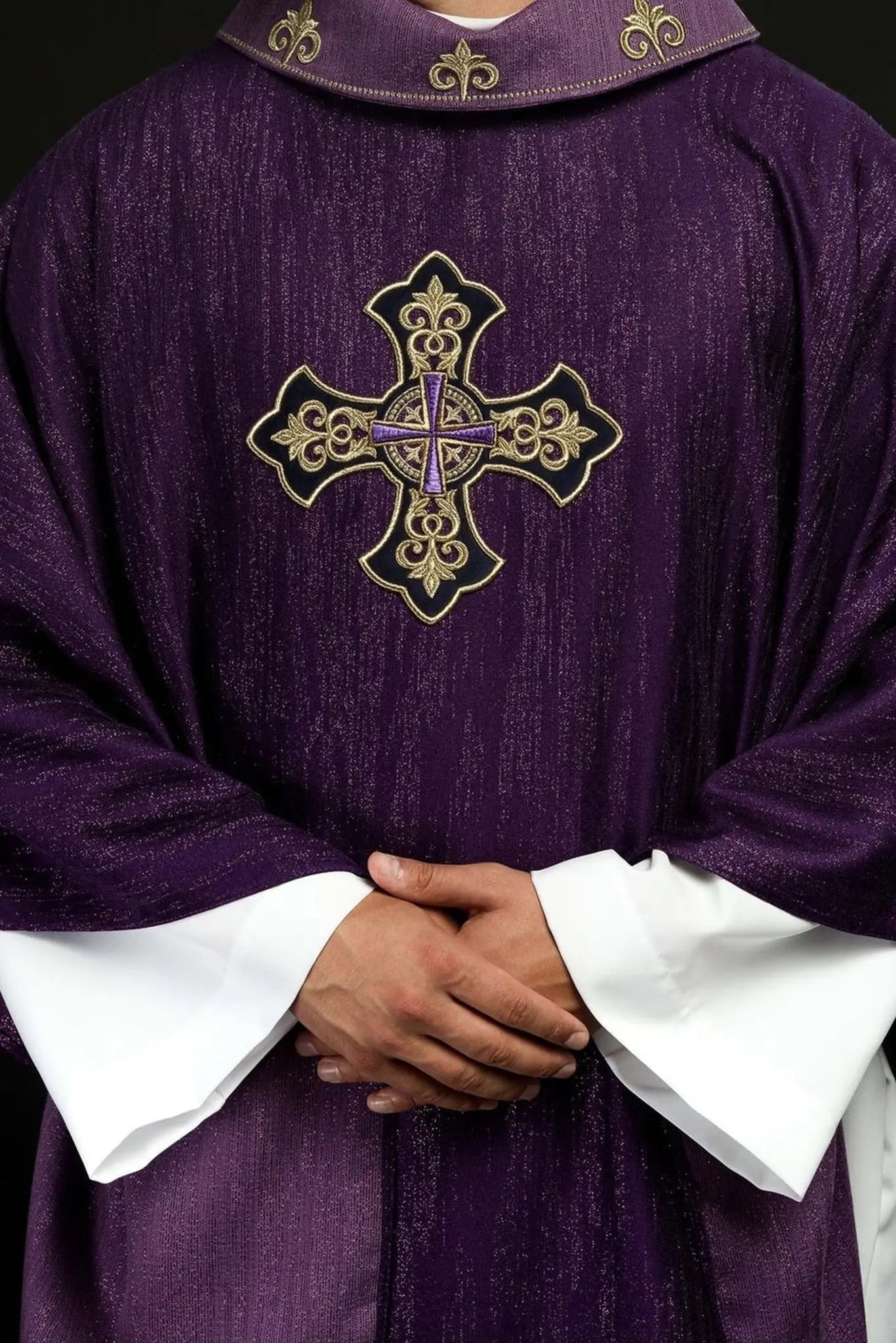 Purple chasuble with embroidered cross motif on de