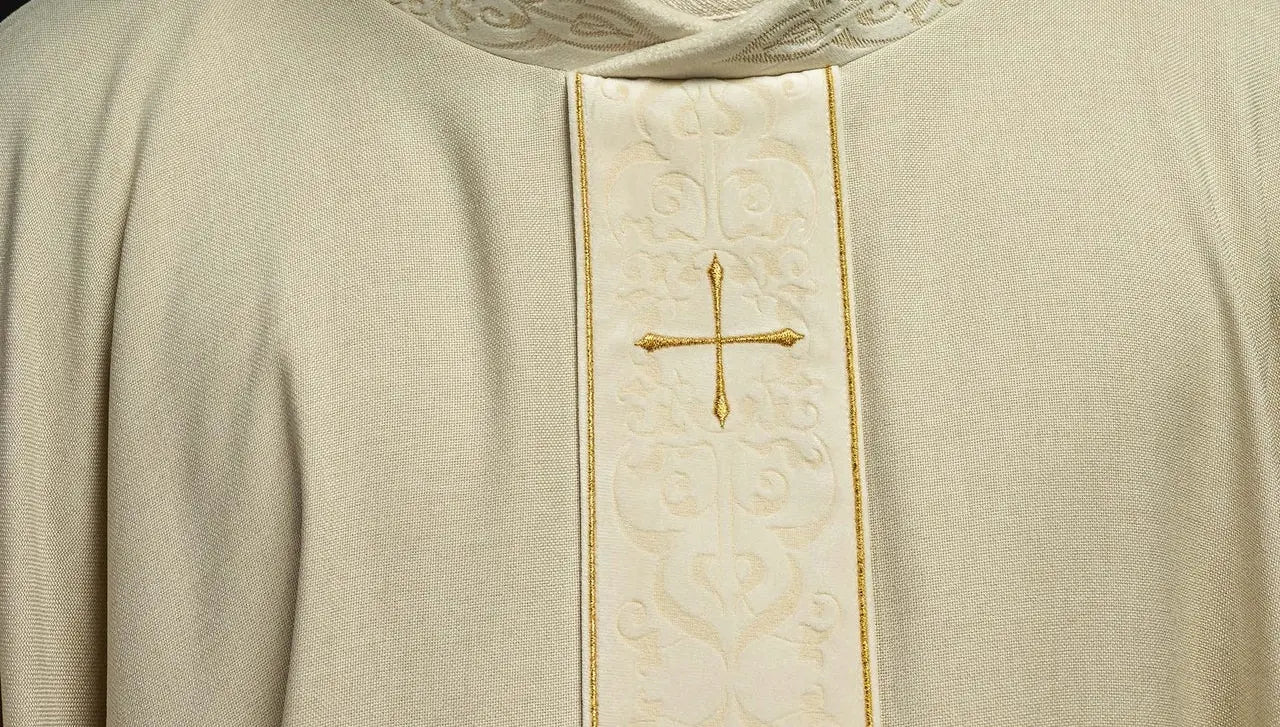 Chasuble in ecru color with an embroidered band and collar decorated with crosses