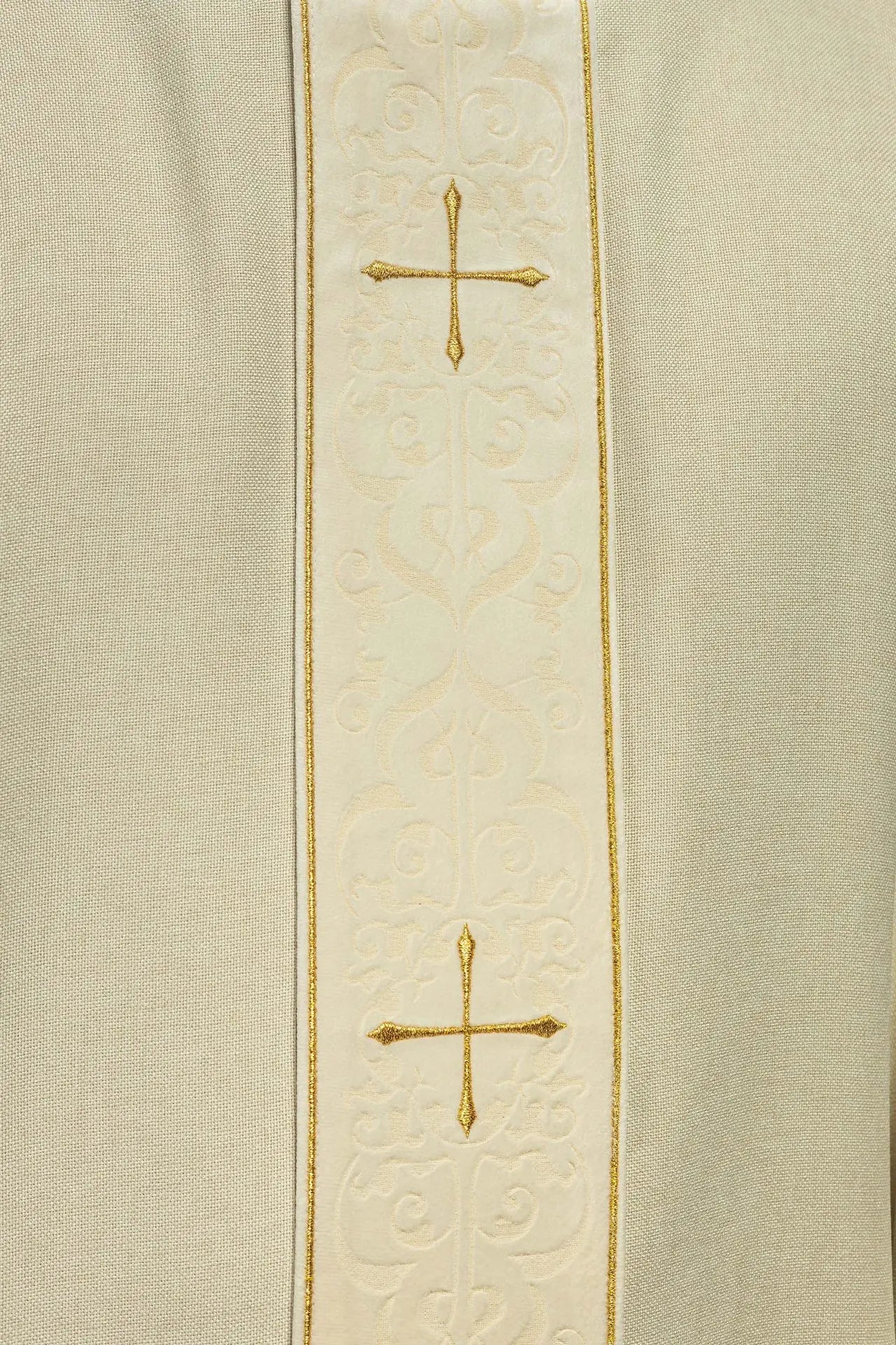 Chasuble in ecru color with an embroidered band and collar decorated with crosses