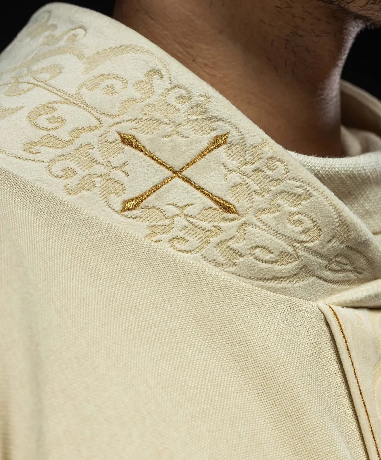 Chasuble in ecru color with an embroidered band and collar decorated with crosses