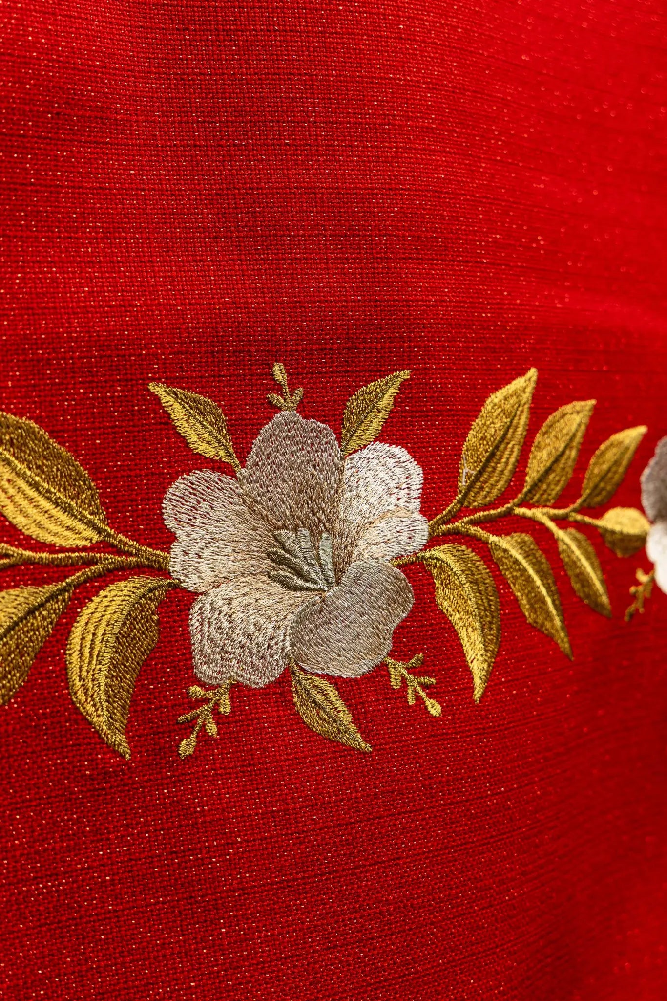 Red lectern hanging with embroidered Dove of the Holy Spirit and rays, finished with gold fringes.