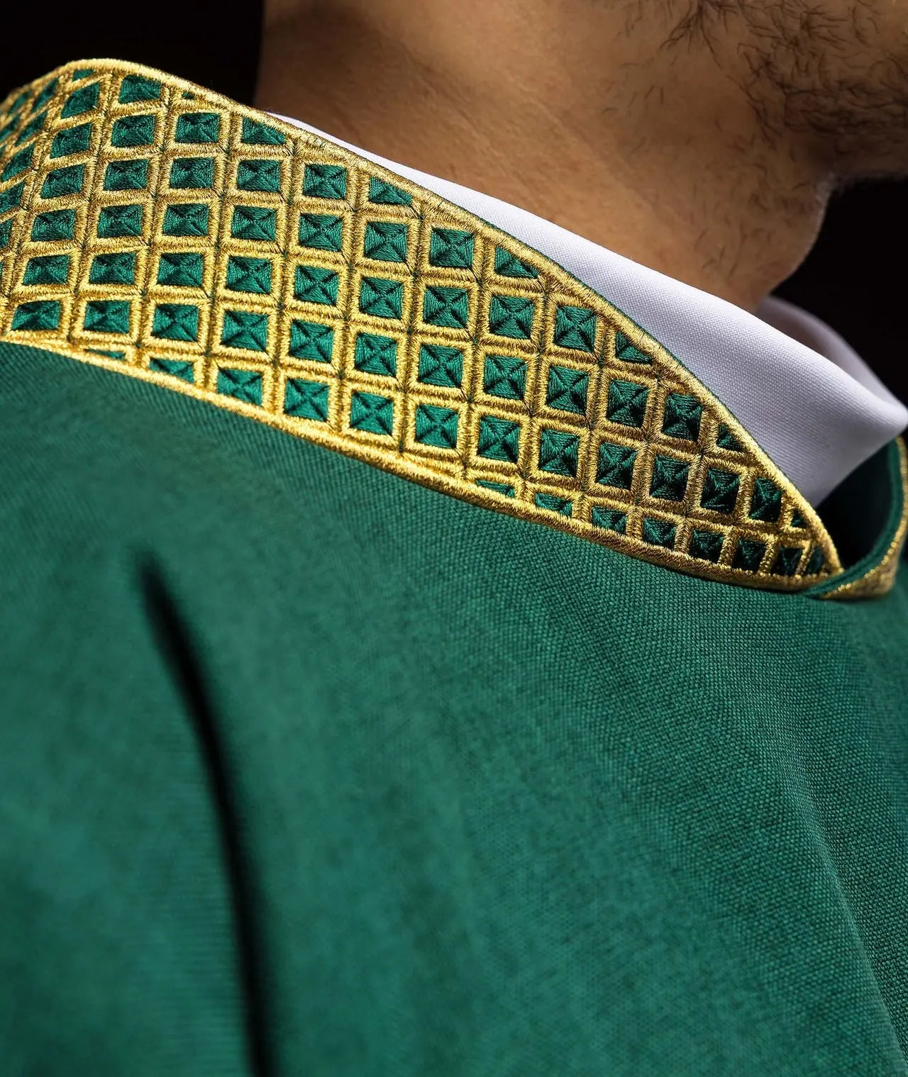 Green dalmatic with embroidered crosses and collar