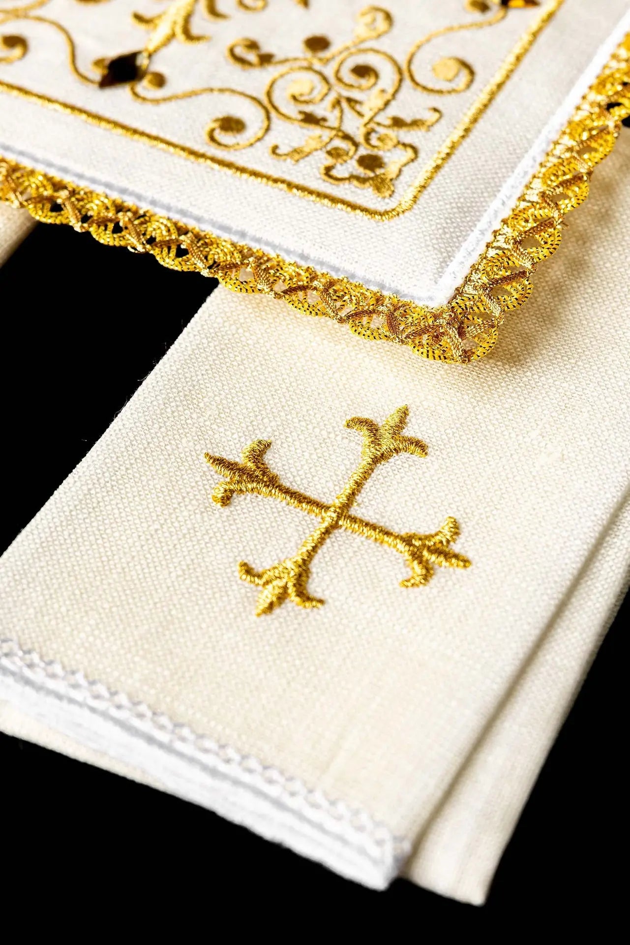 Richly decorated linen cup set with cross embroidery