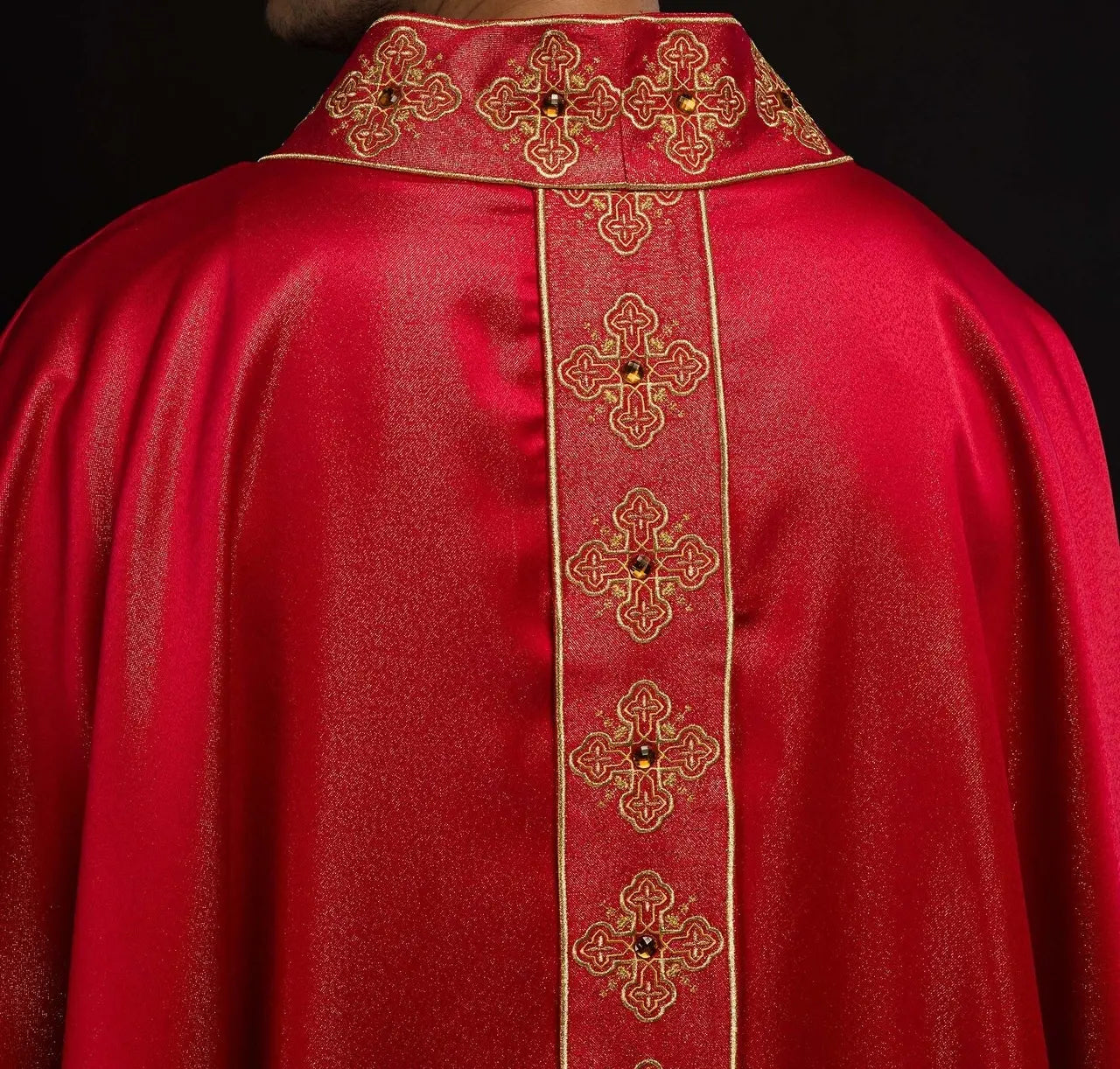 Chasuble in red with embroidered belt and collar decorated with stones